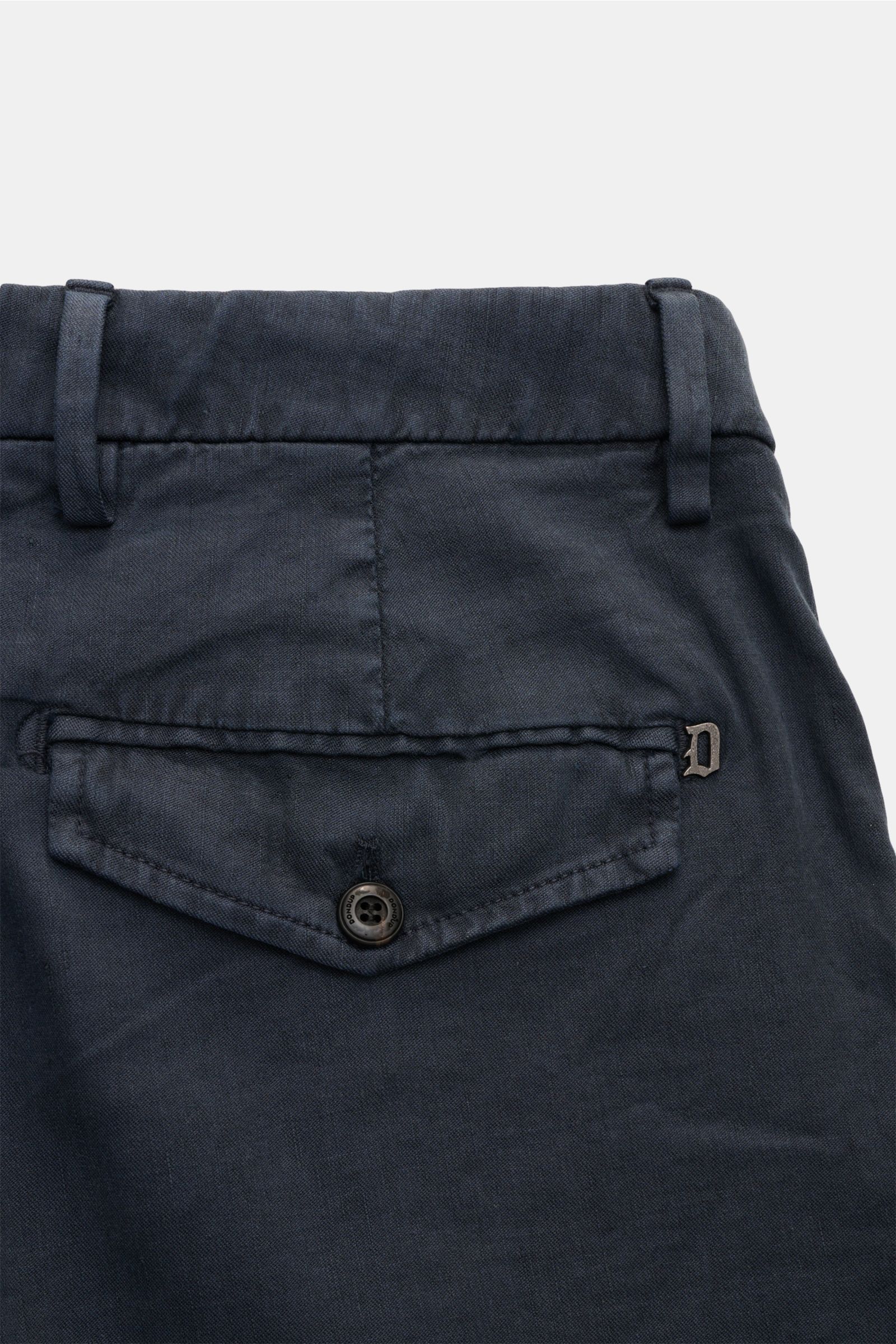 Close-up rear view of Dondup Shorts 'Manheim' navy showing back pocket with flap, button, belt loops, and signature metal initial.

Description: Enjoy carefree days in the warm weather – the 'Manheim' shorts by DONDUP are the perfect choice for summer 