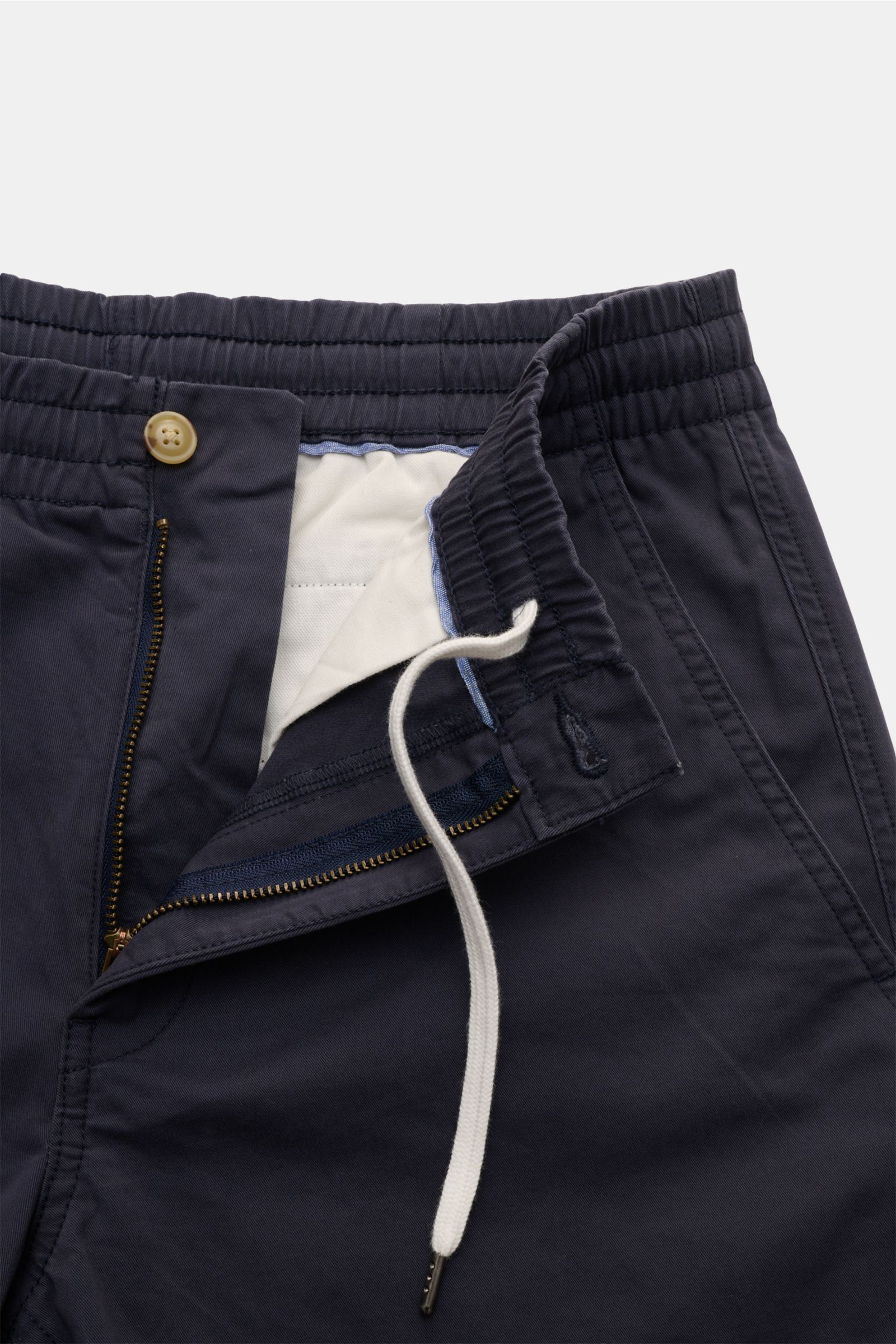 Close-up front view of Polo Ralph Lauren Shorts 'Prepster' navy showing elasticated waistband with drawstring, zip, button, and logo stitching.  

Description: An eye-catching piece for summer: These shorts by POLO RALPH LAUREN are perfect for stylish 
