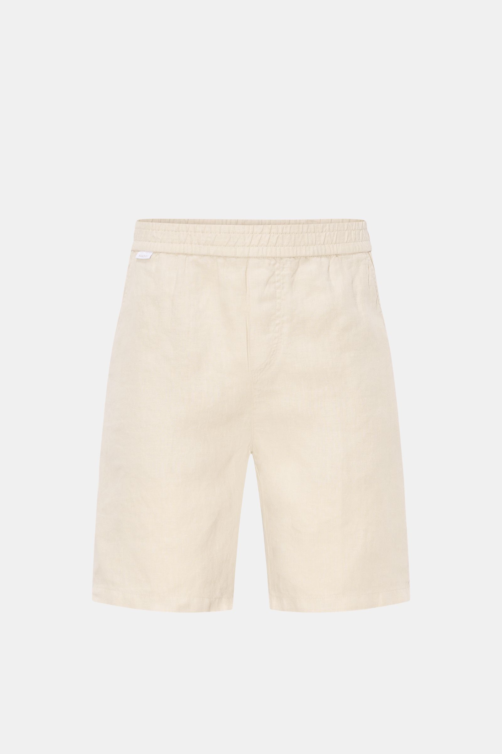 Vorderansicht der 04651/ A trip in a bag Leinenshorts beige aus luftigem Leinen mit elastischem Bund, französischen Taschen und Weblabel.