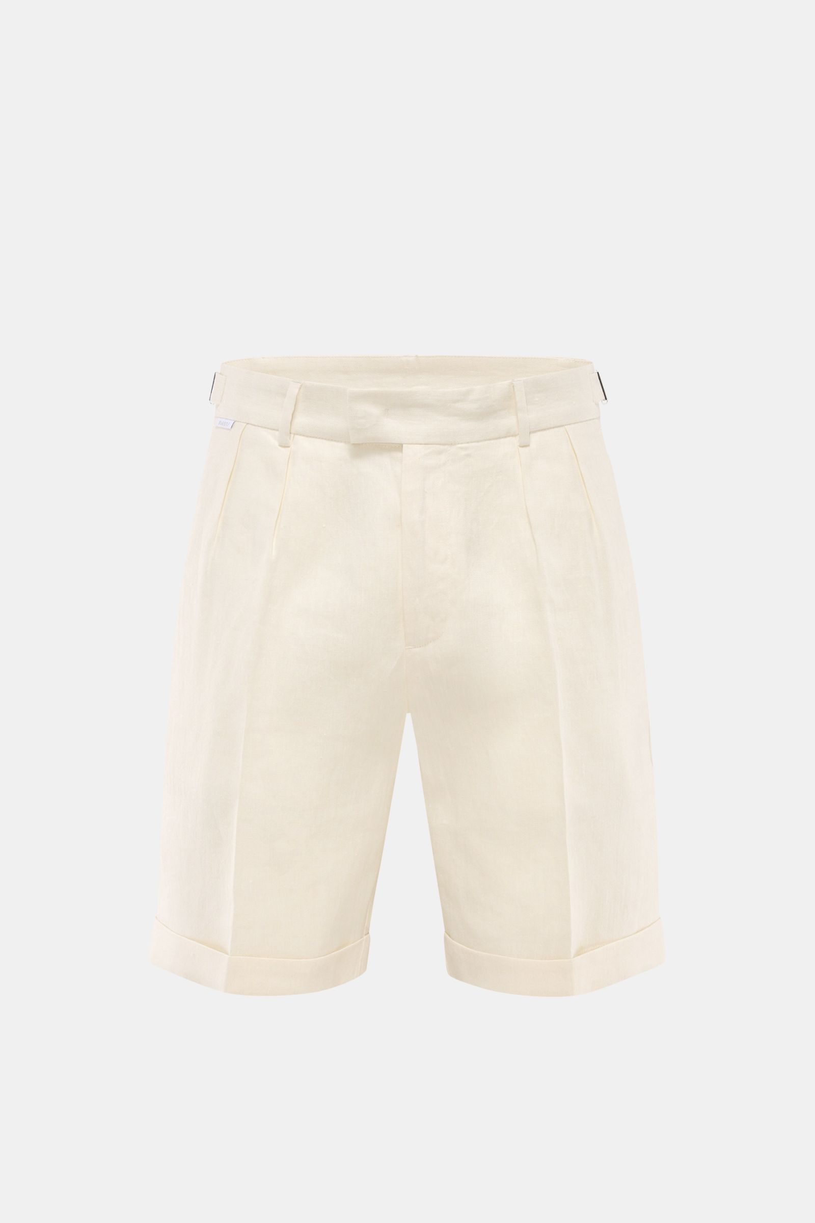 Front view of 04651/ A trip in a bag Linen shorts cream in pure linen with double pleats, side adjusters, French pockets, hip pockets, fixed hem turn-up.

Perfect for warm days: These linen shorts by 04651/ A TRIP IN A BAG are the ideal summer essentia