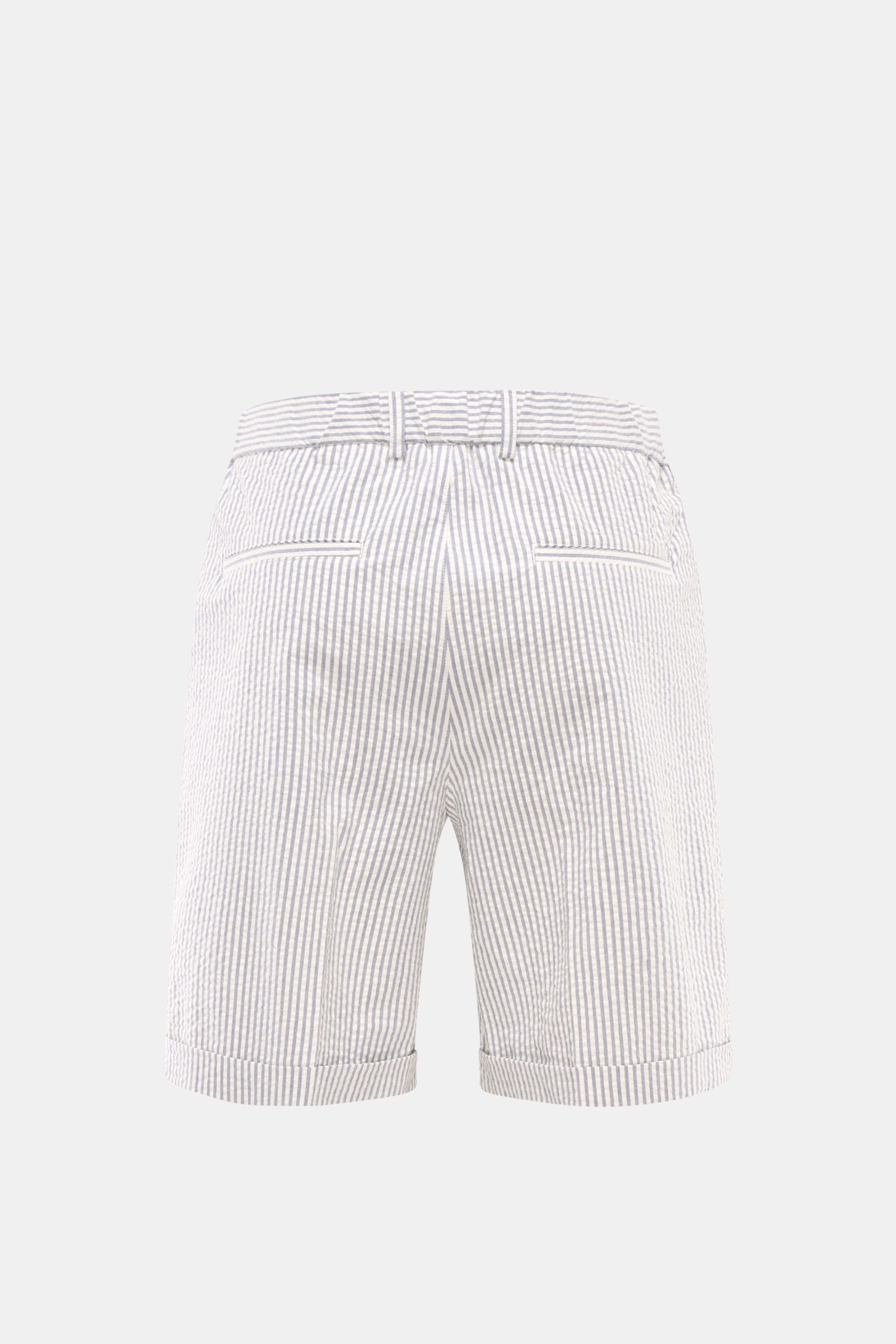 Rear view of 04651/ A trip in a bag Seersucker shorts navy/off-white striped, cotton fabric with elasticated waistband and fixed hem turn-up.

Description:  
Perfect for your next summer holiday: With their design in seersucker look, these shorts by 04