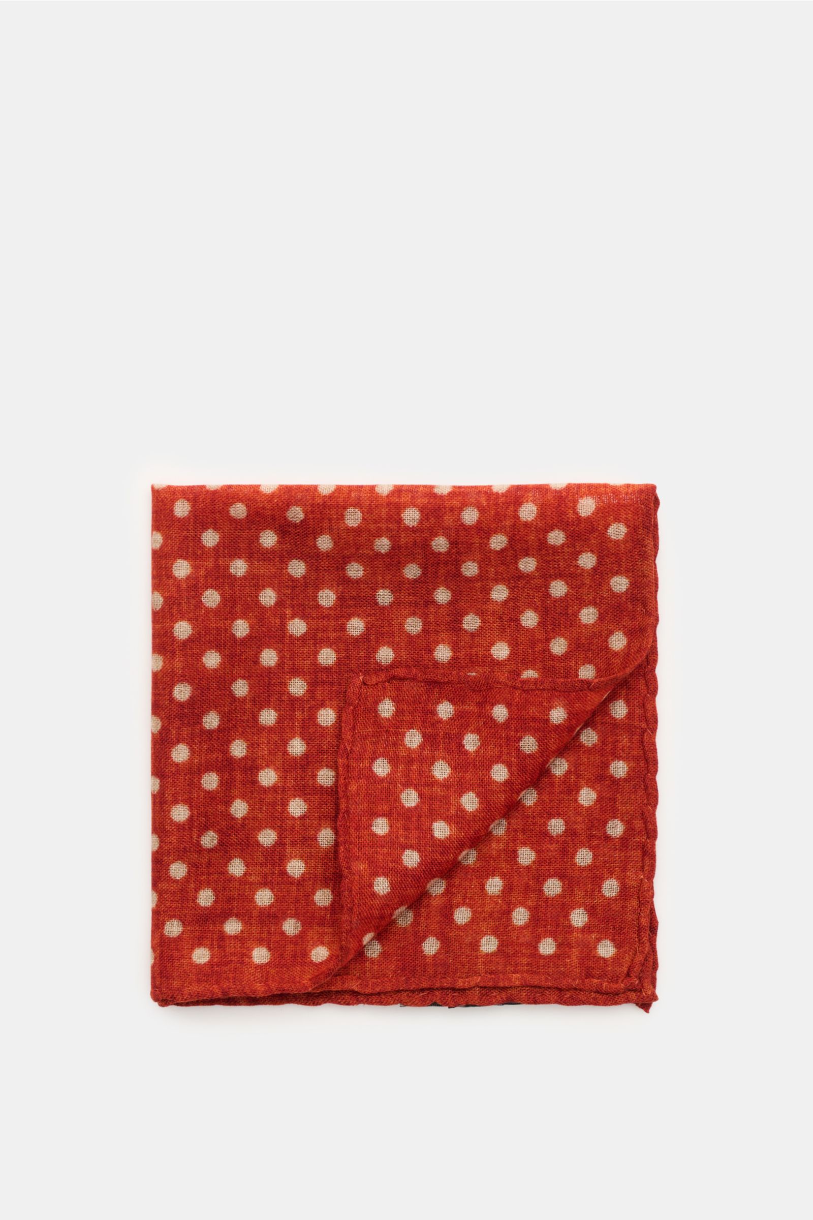 Rosi Collection Einstecktuch rostbraun/beige gepunktet aus reiner Wolle, weicher Griff, grafisches Punktmuster, handrollierte Kanten, Made in Italy, ca. 29x29 cm, Draufsicht.