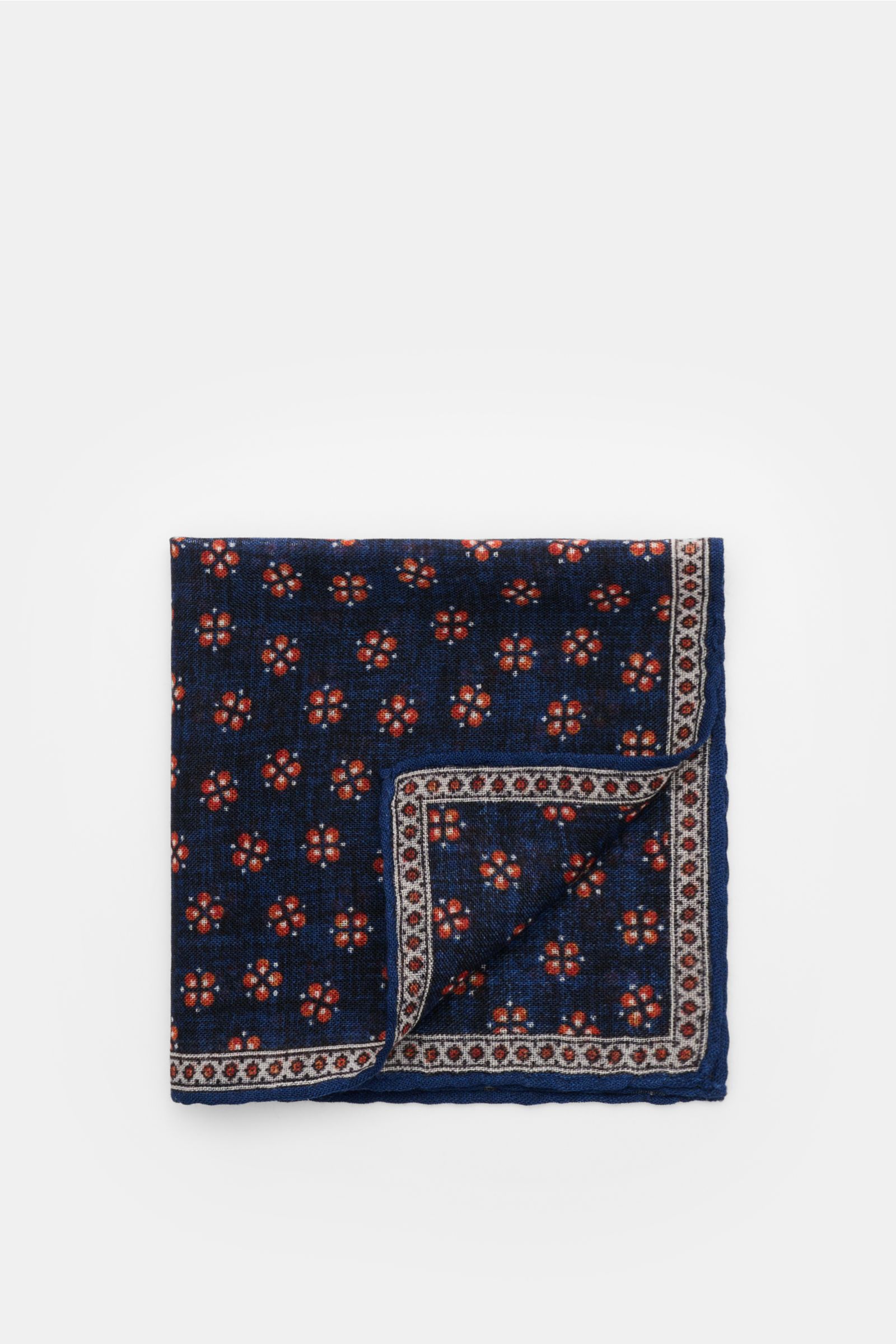 Rosi Collection Einstecktuch 'Ted' dunkelblau meliert/orange/offwhite gemustert, aus reiner Wolle mit floralem Print, rollierten Kanten, flach liegend fotografiert.