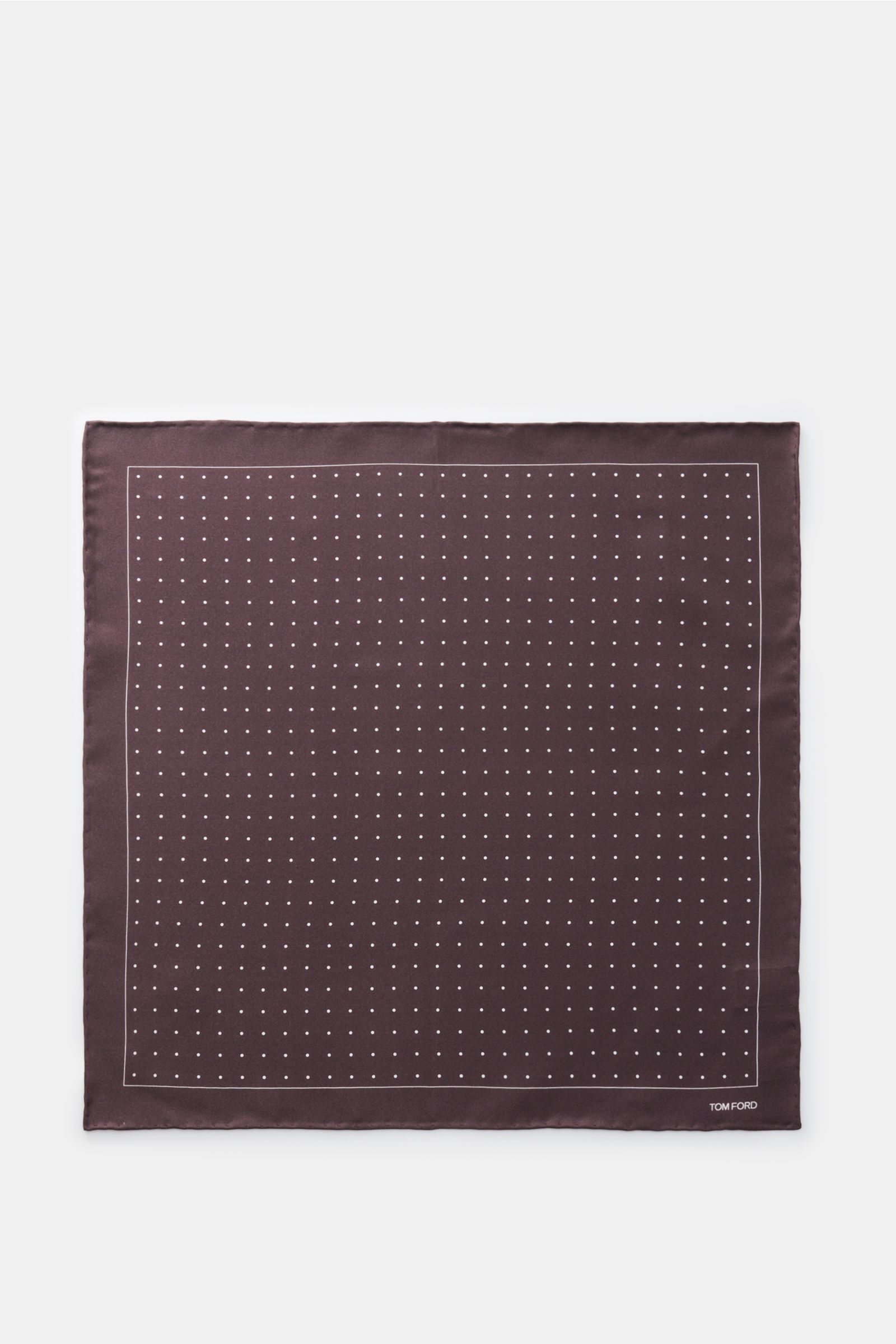 Top view of Tom Ford Seiden-Einstecktuch dunkelbraun/weiß gepunktet, a pure silk pocket square with smooth touch, dotted pattern, rolled edges, and small TOM FORD print, made in Italy, approx. 40x40 cm. 

Description: Dieses Einstecktuch von TOM FORD a