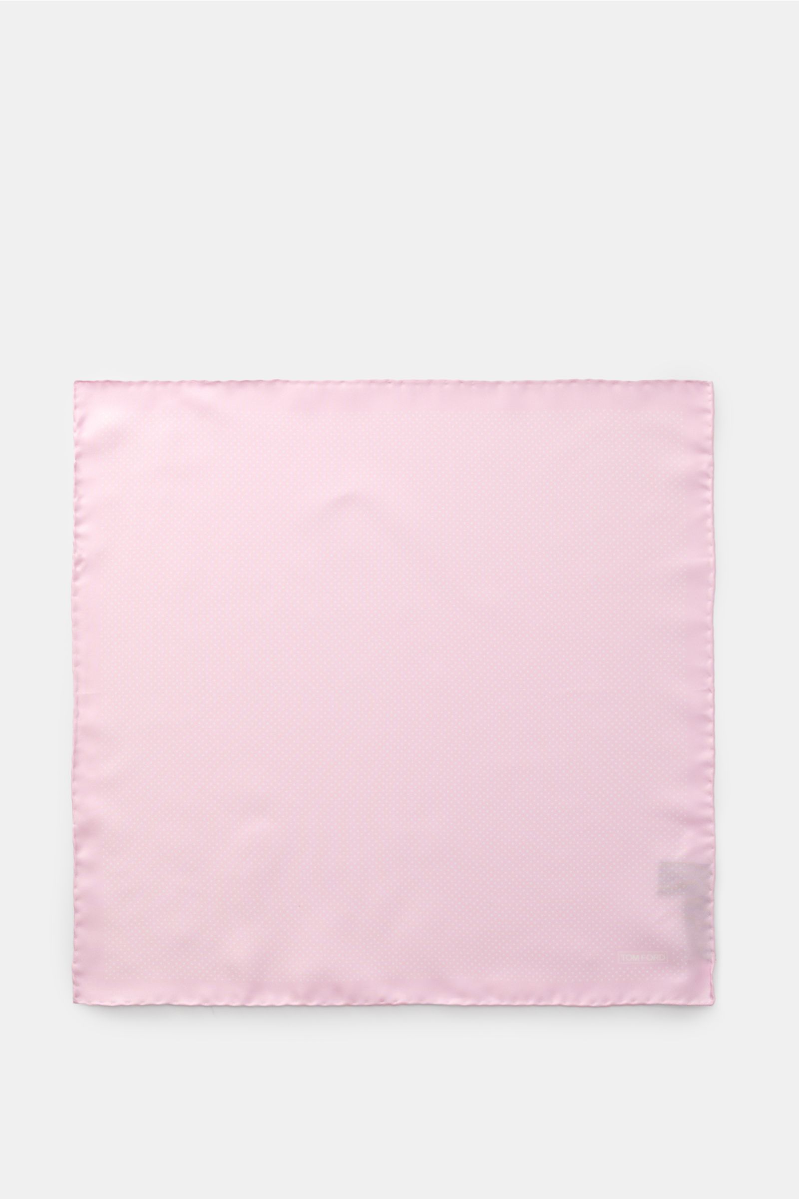 Top-down view of Tom Ford Seiden-Einstecktuch rosé/weiß gepunktet, a pure silk pocket square with subtle dot pattern, rolled edges, smooth touch, small Tom Ford print, made in Italy, approx. 39x39 cm. This elegant accessory adds class and style to any jac