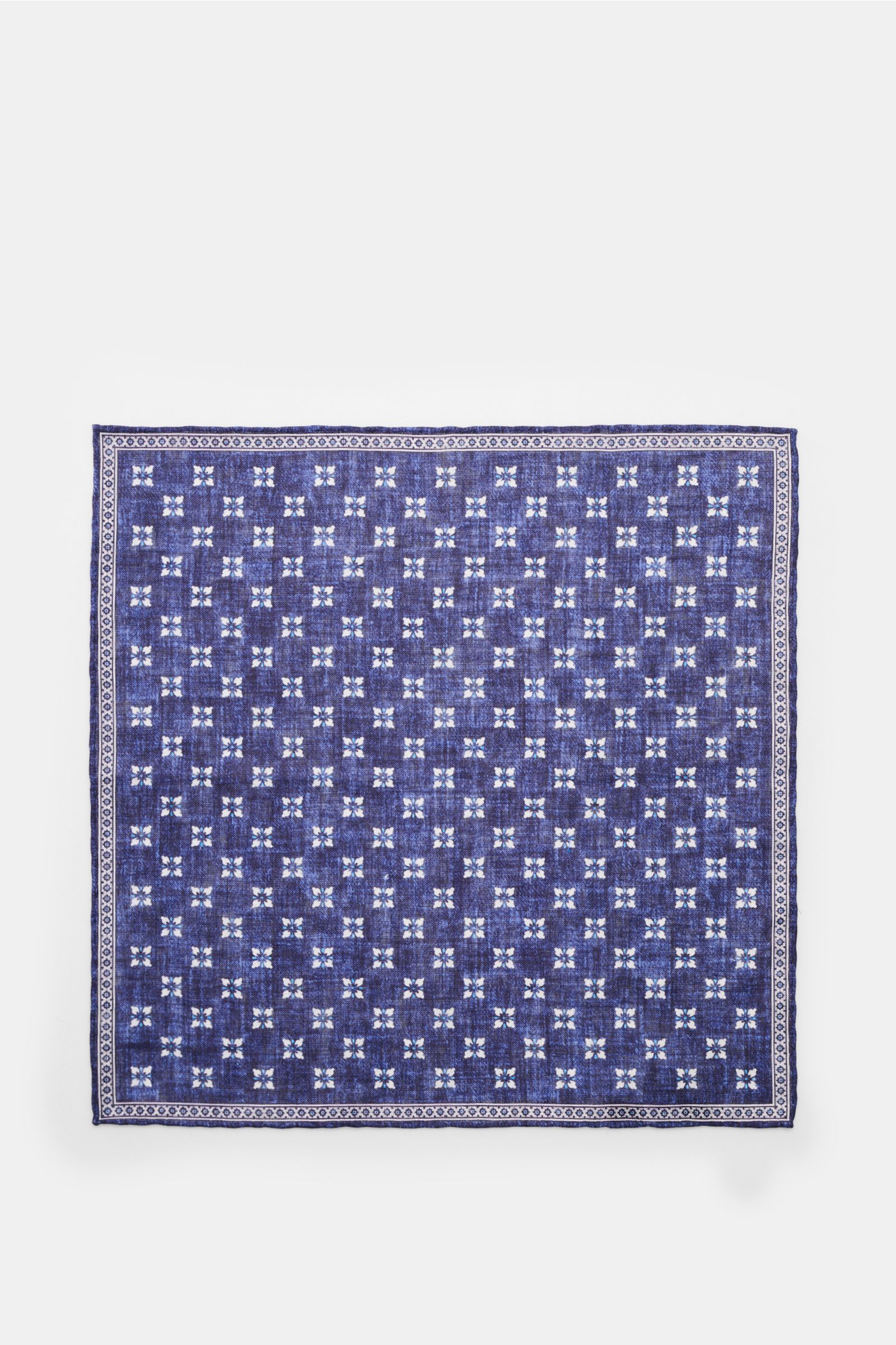 Rosi Collection Linen pocket square 'Fox' dark blue/light blue/white patterned shown from above, pure linen, soft feel, floral print with edging, rolled edges, made in Italy, dimensions 31 cm x 31 cm.
