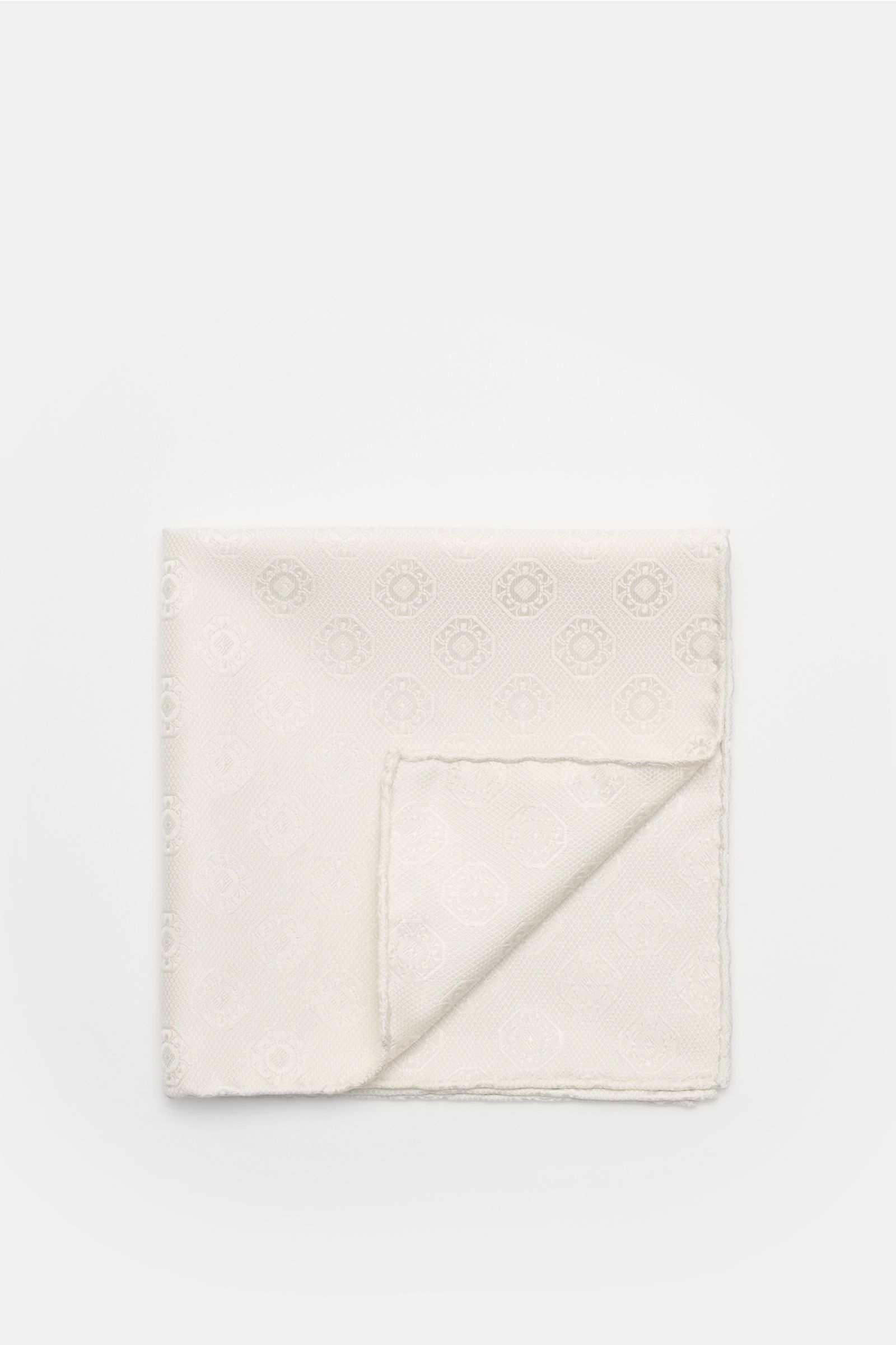 Alt tag (125 characters max):
Brunello Cucinelli Silk pocket square cream patterned with medallion weave, rolled edges, photographed from above on white background.

Additional description:
Elegant accent: This silk pocket square by BRUNELLO CUCINELLI 