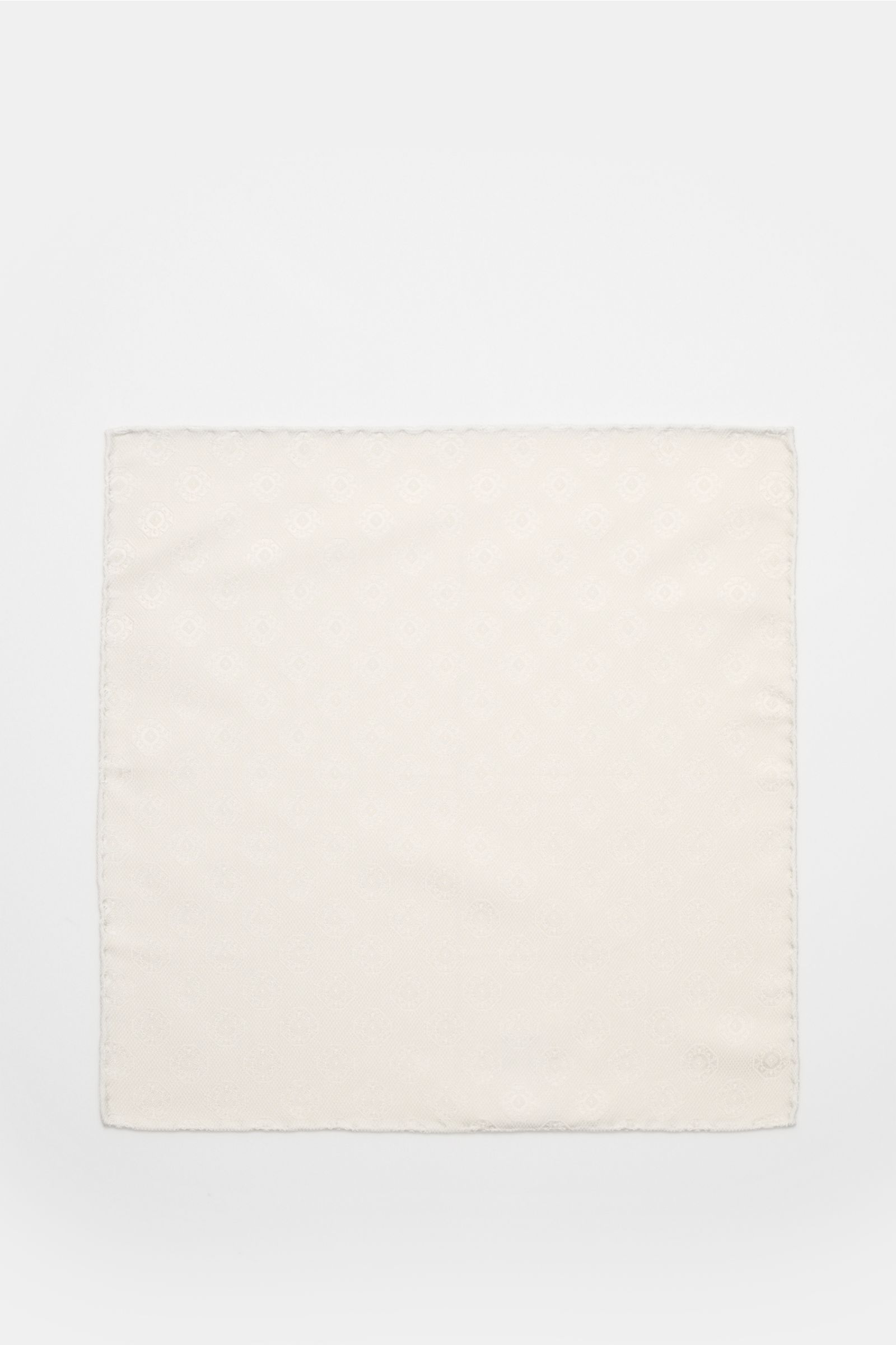 Alt tag (125 characters max):  
Brunello Cucinelli Silk pocket square cream patterned, flat lay top view showing medallion weave and rolled edges.

Additional description:  
Elegant accent: This silk pocket square by BRUNELLO CUCINELLI has a fine medal