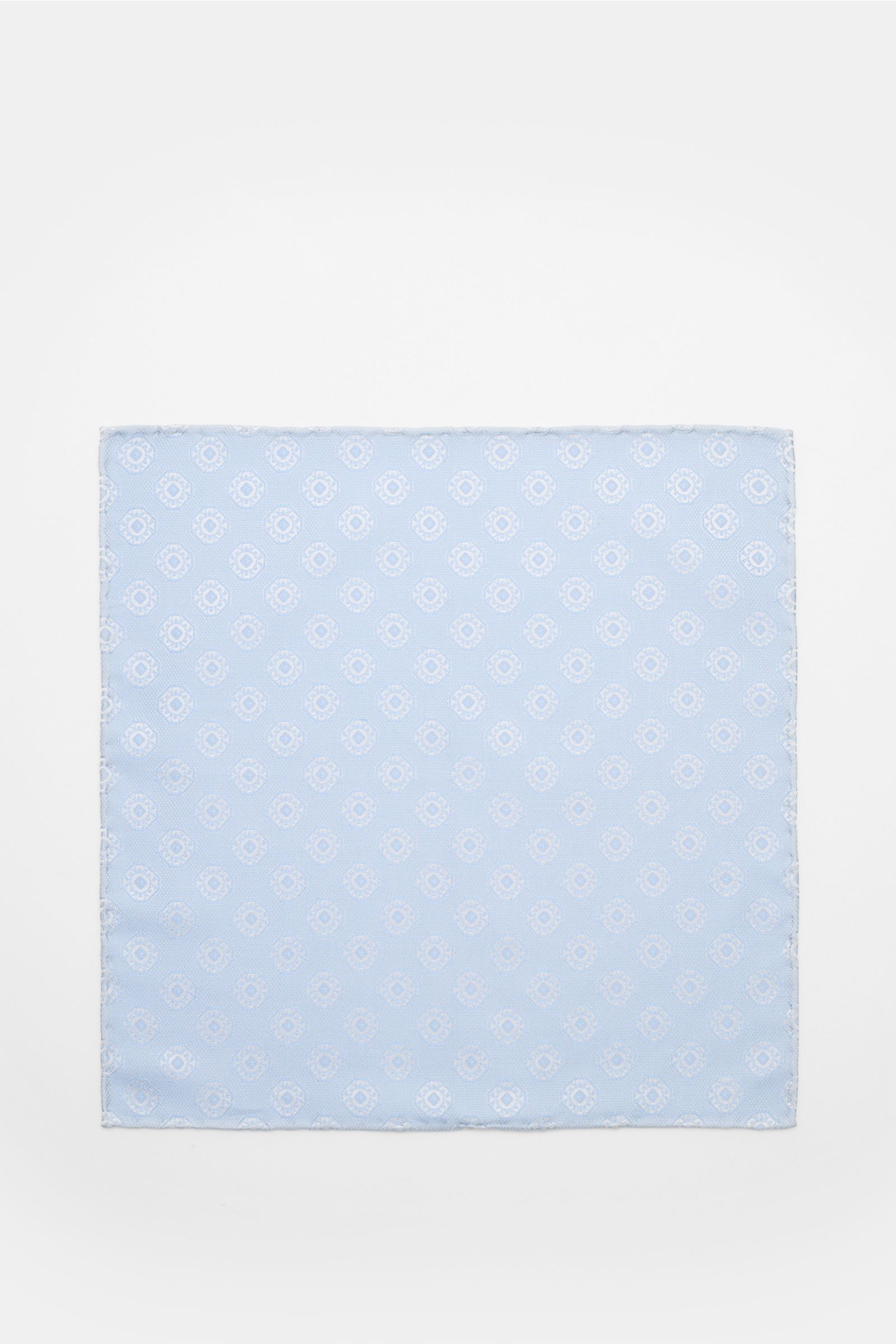 Alt tag (125 characters max):
Top-down view of Brunello Cucinelli Silk pocket square light blue/light grey patterned with fine medallion weave and rolled edges.

Additional description:
Elegant accent: This silk pocket square by BRUNELLO CUCINELLI has 