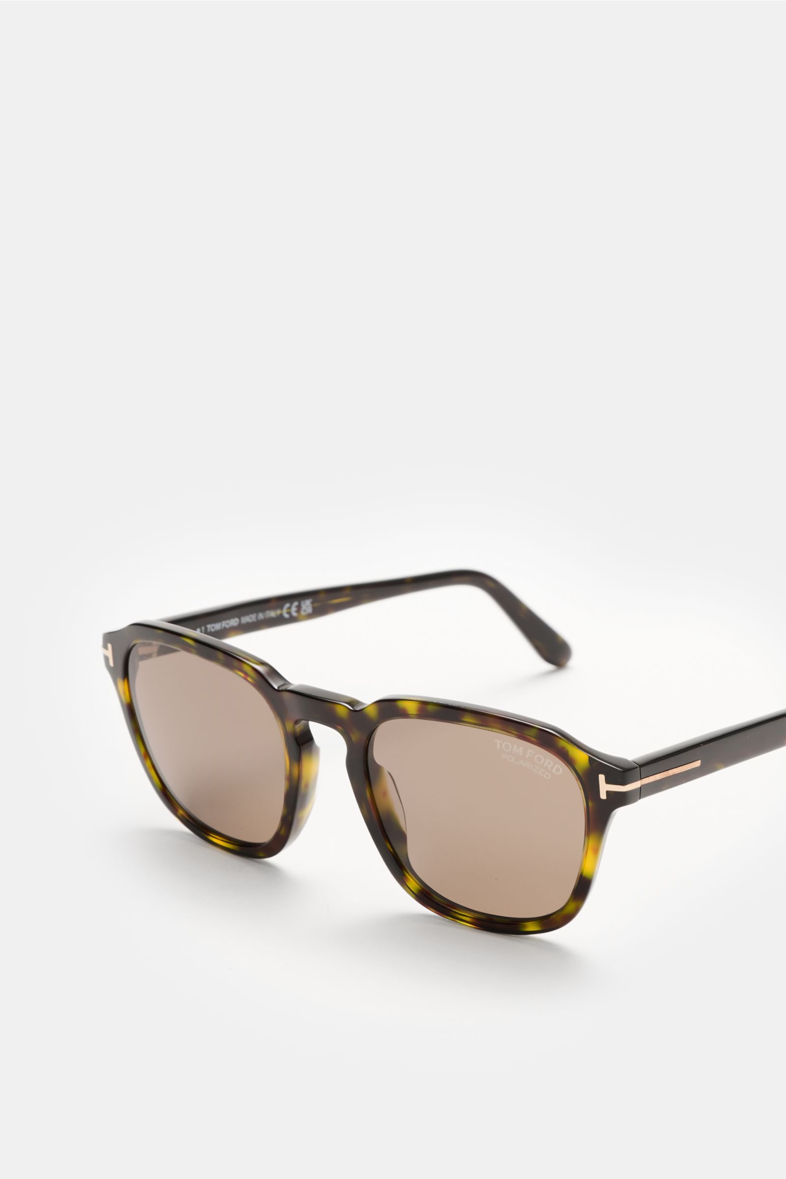 Front-side angled view of Tom Ford Sunglasses 'Avery' green/dark brown patterned with square acetate frame, polarized plastic lenses, and classic tortoiseshell design. TOM FORD guarantees a smart look with these 'Avery' sunglasses in a timeless tortoisesh