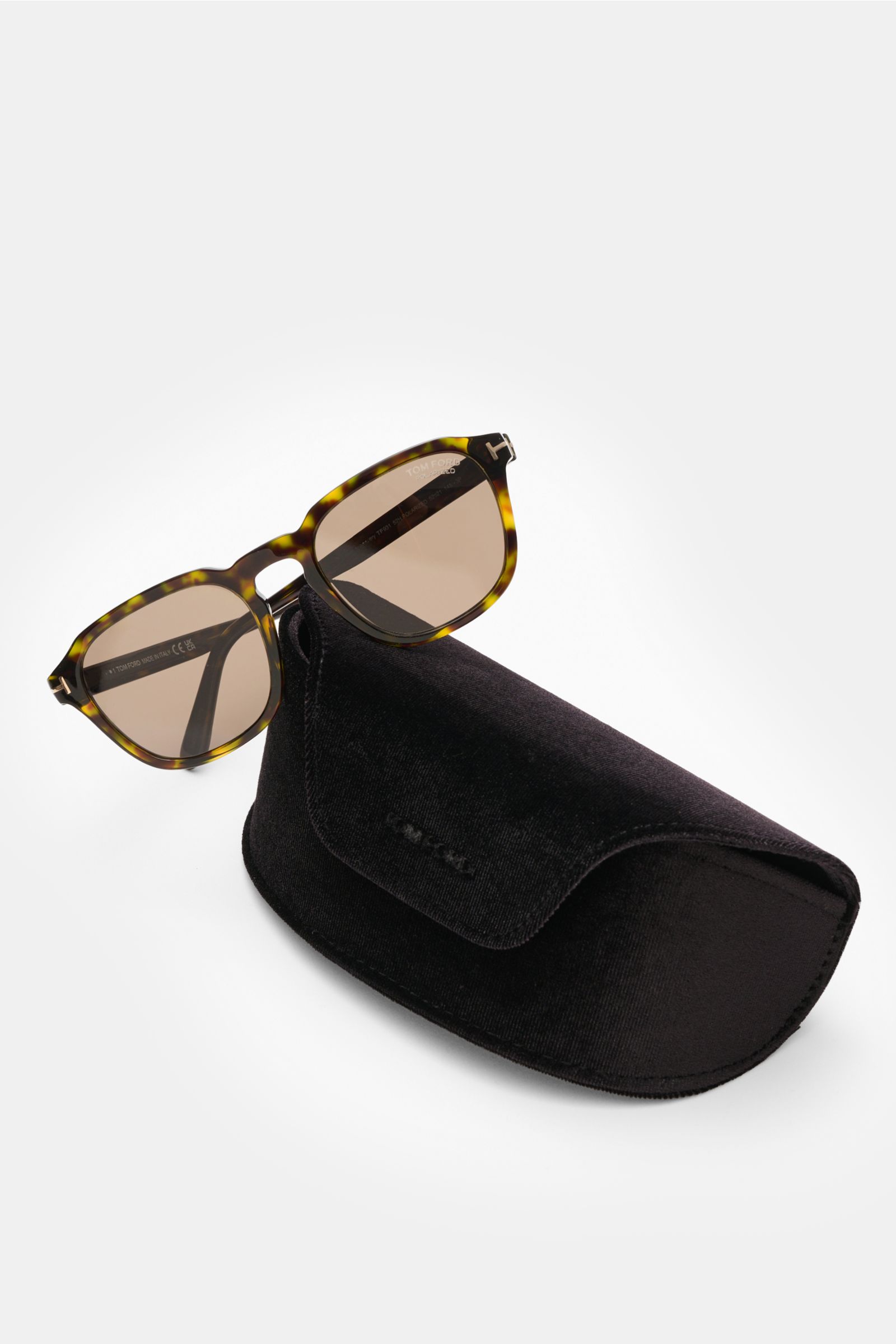 Tom Ford Sunglasses 'Avery' green/dark brown patterned with square acetate frame, polarised plastic lenses, 100% UV protection, shown from front angle resting on black velvet hard case.