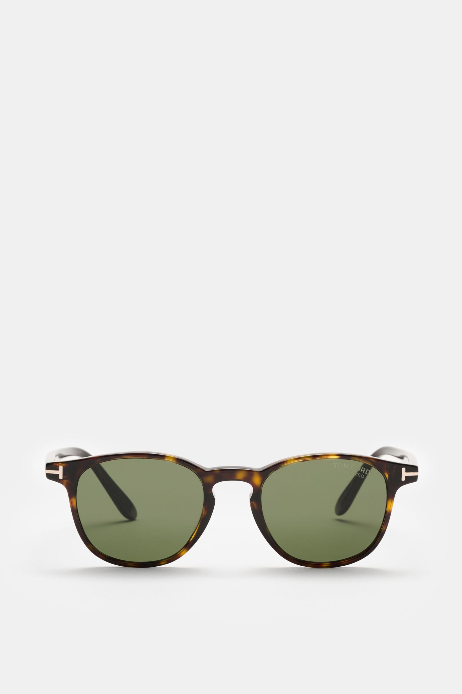 Tom Ford Sonnenbrille 'Holt' dunkelbraun meliert/grün, frontal fotografiert, mit leicht gerundeter Silhouette, polarisierte Kunststoffgläser, Acetat-Rahmen und 100% UV-Schutz.