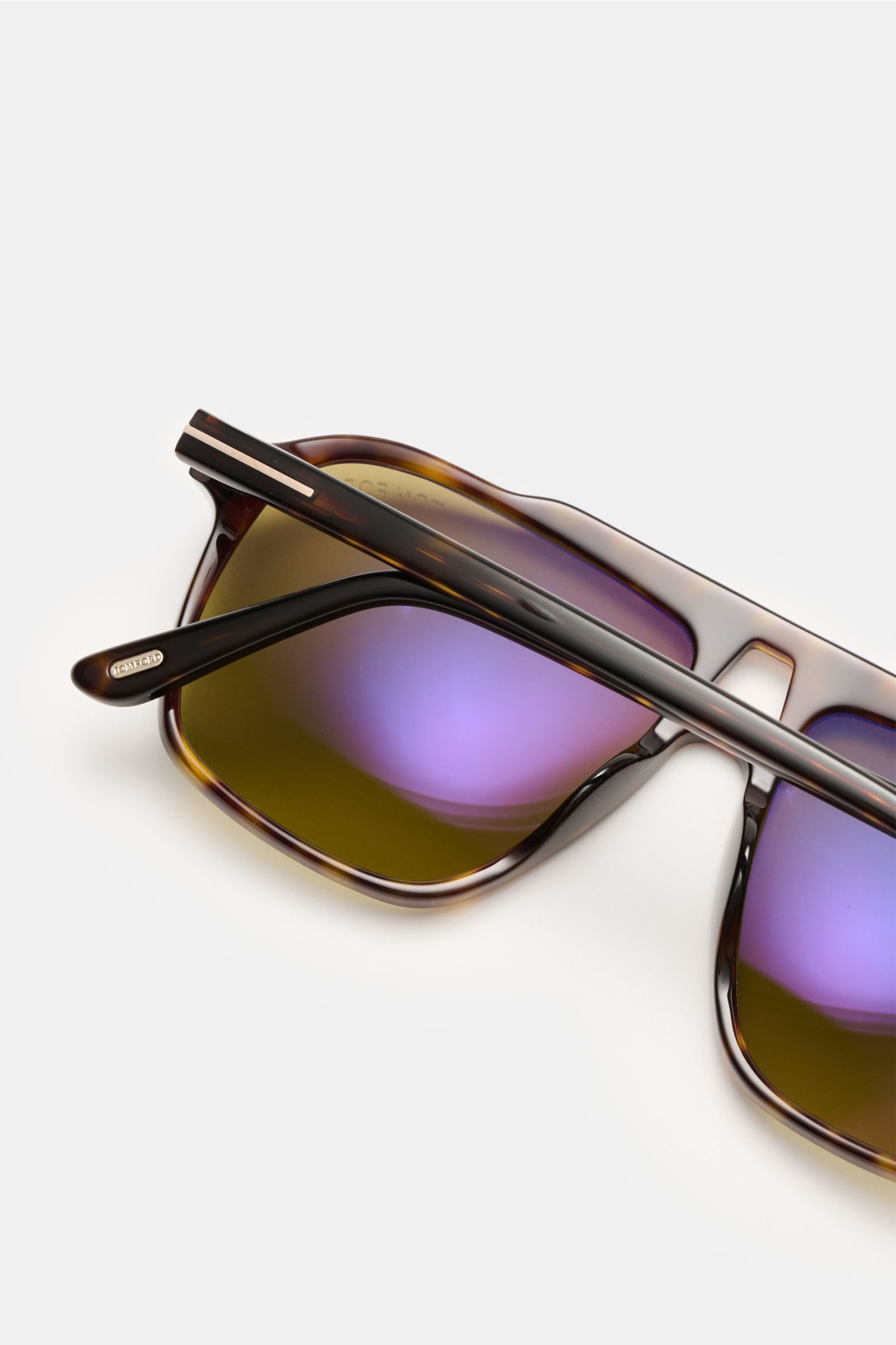 Close-up rear perspective of Tom Ford Sunglasses 'Autari' dark brown/light brown mottled with classic aviator style, acetate frame, and evenly tinted plastic lenses.