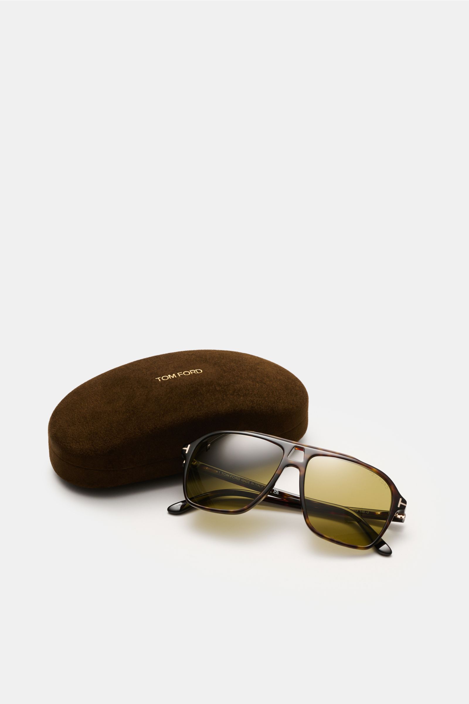 Tom Ford Sunglasses 'Autari' dark brown/light brown mottled in classic aviator style, acetate frame, evenly tinted lenses, 100% UV protection, shown front angled with velvet hard case behind.