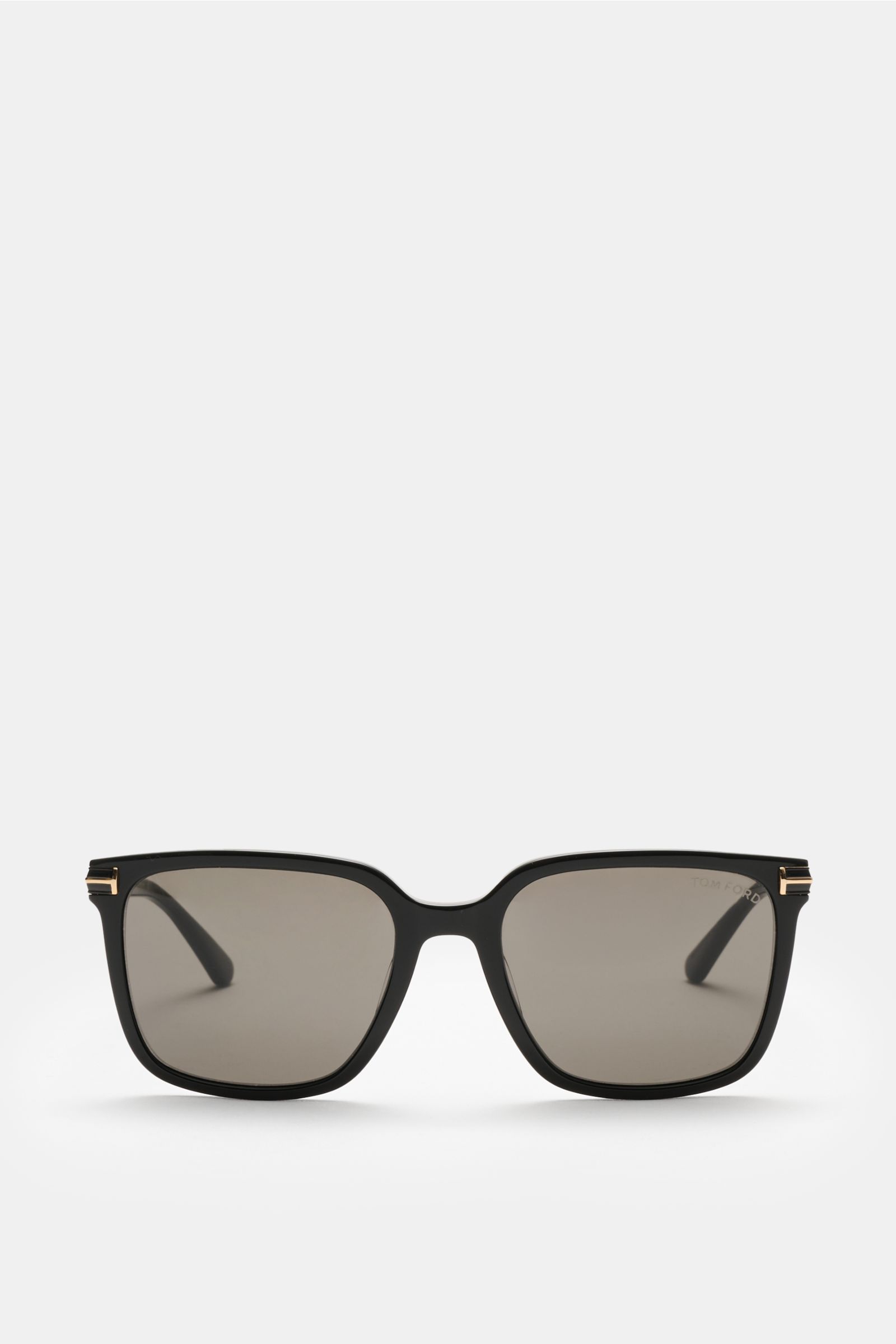 Front view of Tom Ford Sunglasses 'Jochem' black with slightly square shape, evenly tinted plastic lenses, and acetate frame. Stylish all-rounder: With their timeless design, these sunglasses by TOM FORD are an ideal summer essential. Slightly square shap