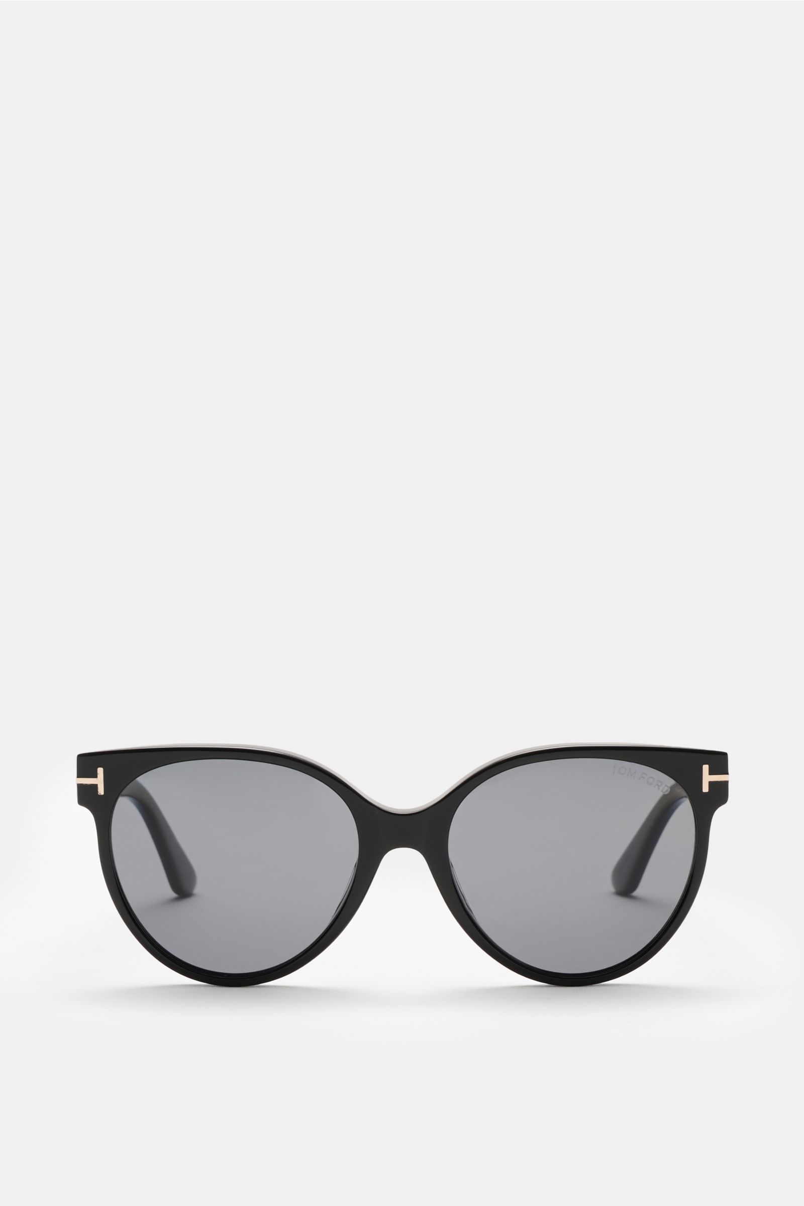 Front view of Tom Ford Sunglasses 'Tallulah' black with classic papillon style, evenly tinted plastic lenses, acetate frame, and 100% UV protection. Stylish all-rounder for versatile summer looks with velvet hard case included.