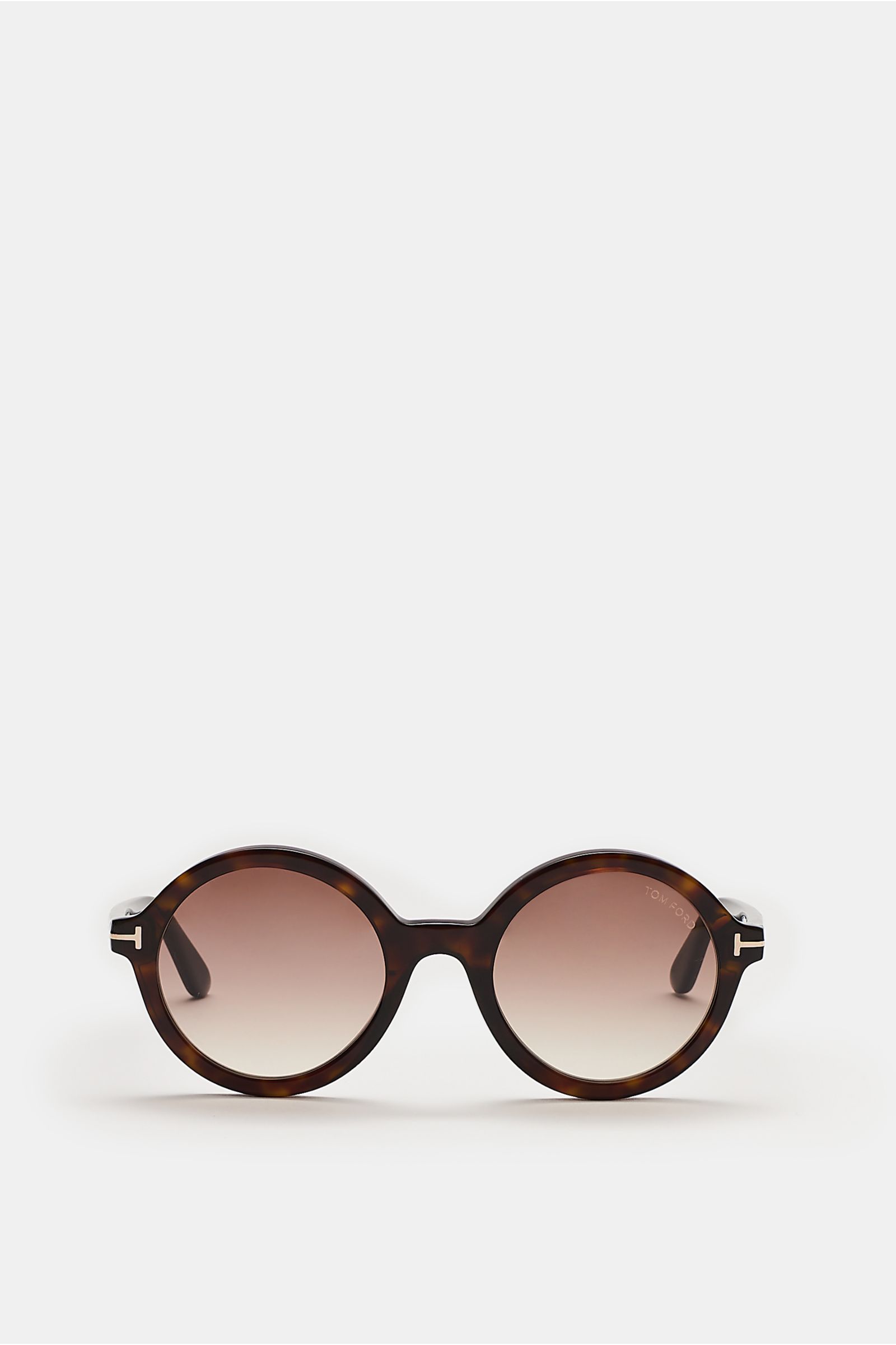 Front view of Tom Ford Sonnenbrille 'Nicolette' dunkelbraun gemustert with round acetate frame, tortoiseshell pattern, gradient lenses, 'T' detail, UV protection, and velvet case.