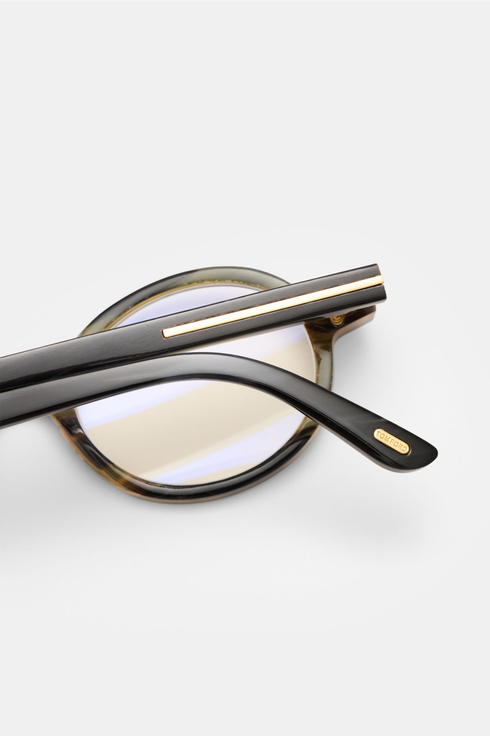 Tom Ford Horn Brille 'Private Collection' schwarz/grau/hellbraun gemustert, Detailaufnahme von oben, runder Rahmen aus Büffelhorn mit Blaulichtfilter.