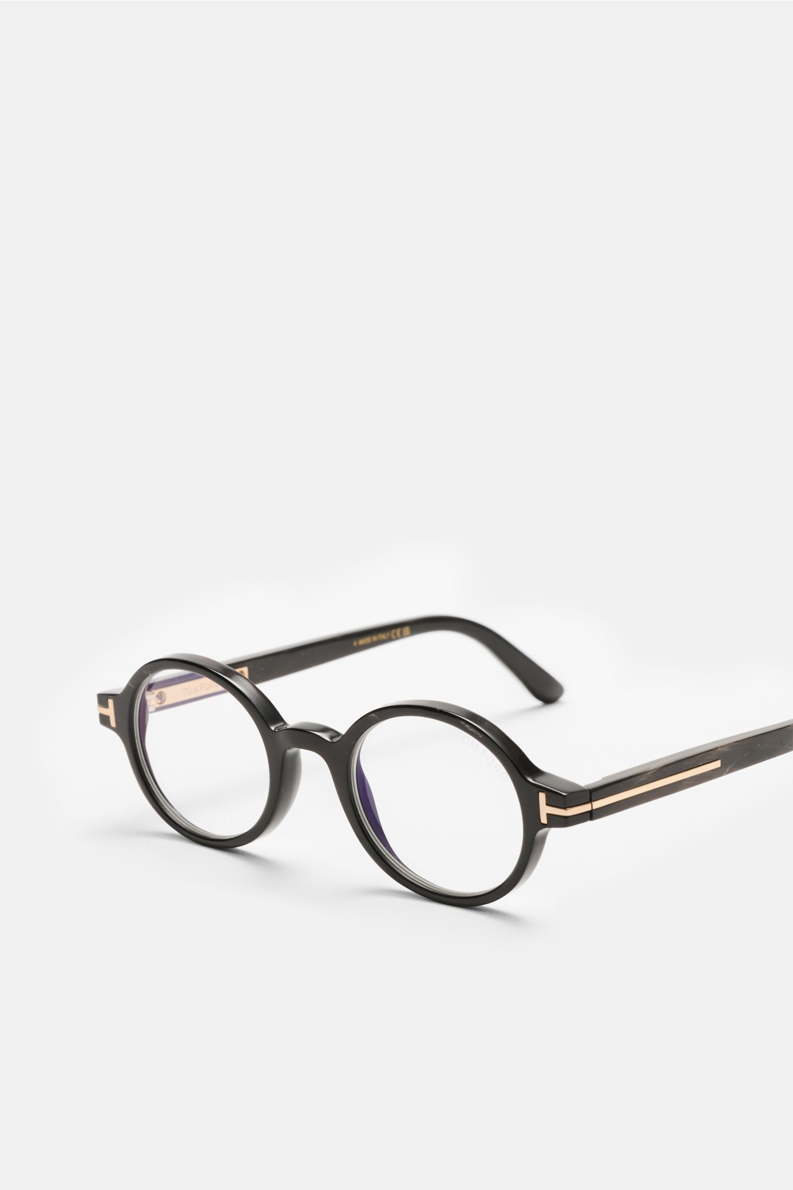 Tom Ford Horn Brille 'Private Collection' schwarz/grau gemustert, runde Form, Büffelhornrahmen, Blaulichtfilter, T-Form Details, seitliche Perspektive.