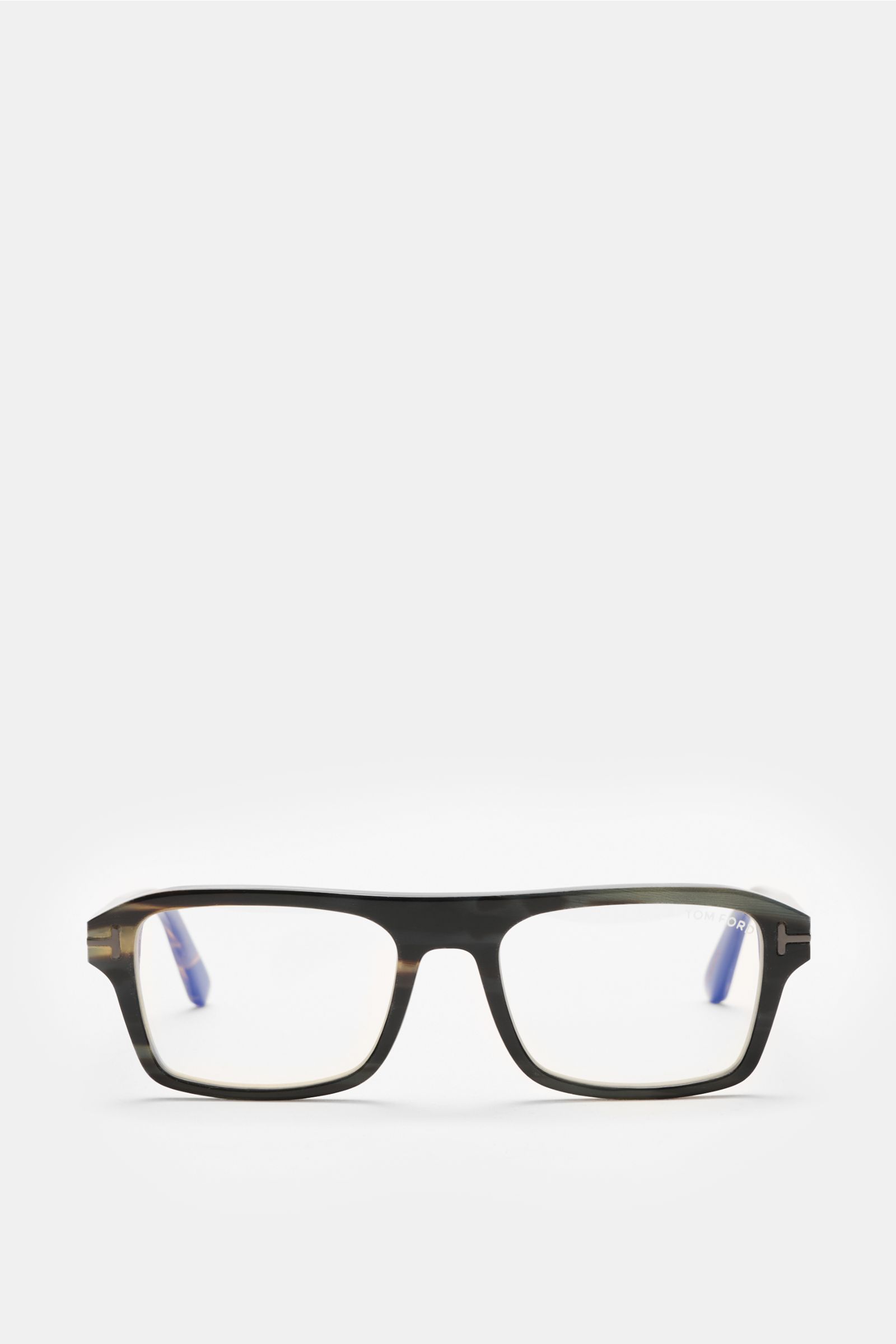 Front view of Tom Ford Horn Brille 'Private Collection' schwarz/grau gemustert with rectangular buffalo horn frame, blue light filter lenses, and T-shaped details, styled as a stylish retro essential for the workplace. Stilvoller Eyecatcher: Die exklus