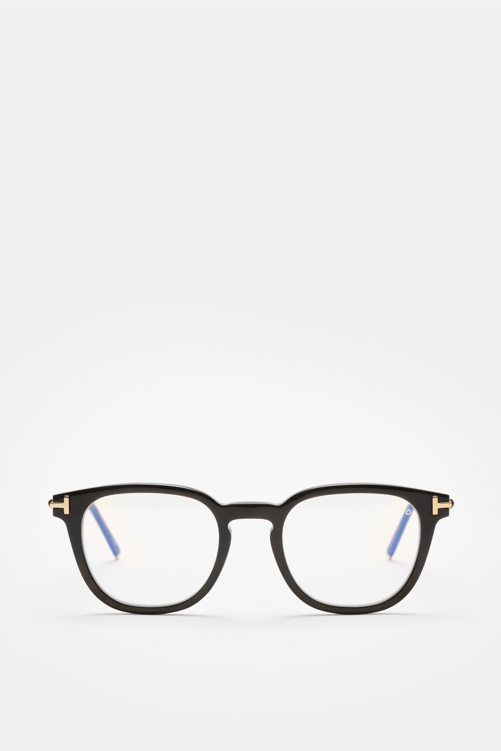 Front view of the Tom Ford Horn Brille 'Private Collection' schwarz, featuring a slightly rounded silhouette with real buffalo horn frame, blue light filter lenses, T-shaped details; a stylish eyecatcher and practical essential for the workplace.