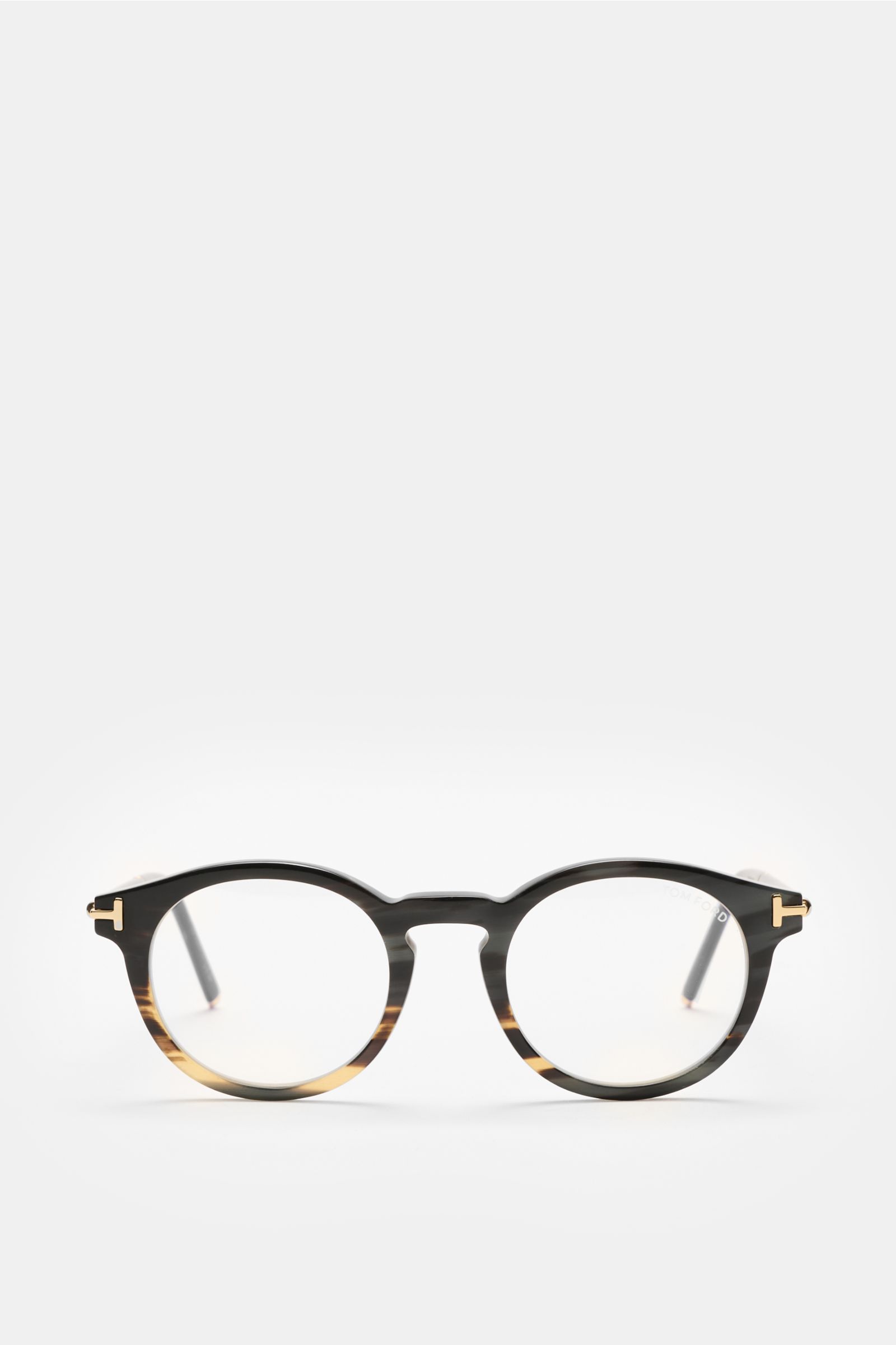 Front view of Tom Ford Horn Brille 'Private Collection' schwarz/grau gemustert, a stylish round horn frame with blue light filter lenses and T-shaped details. Stilvoller Eyecatcher: Die exklusive Horn Brille aus der 'Private Collection' von TOM FORD besti