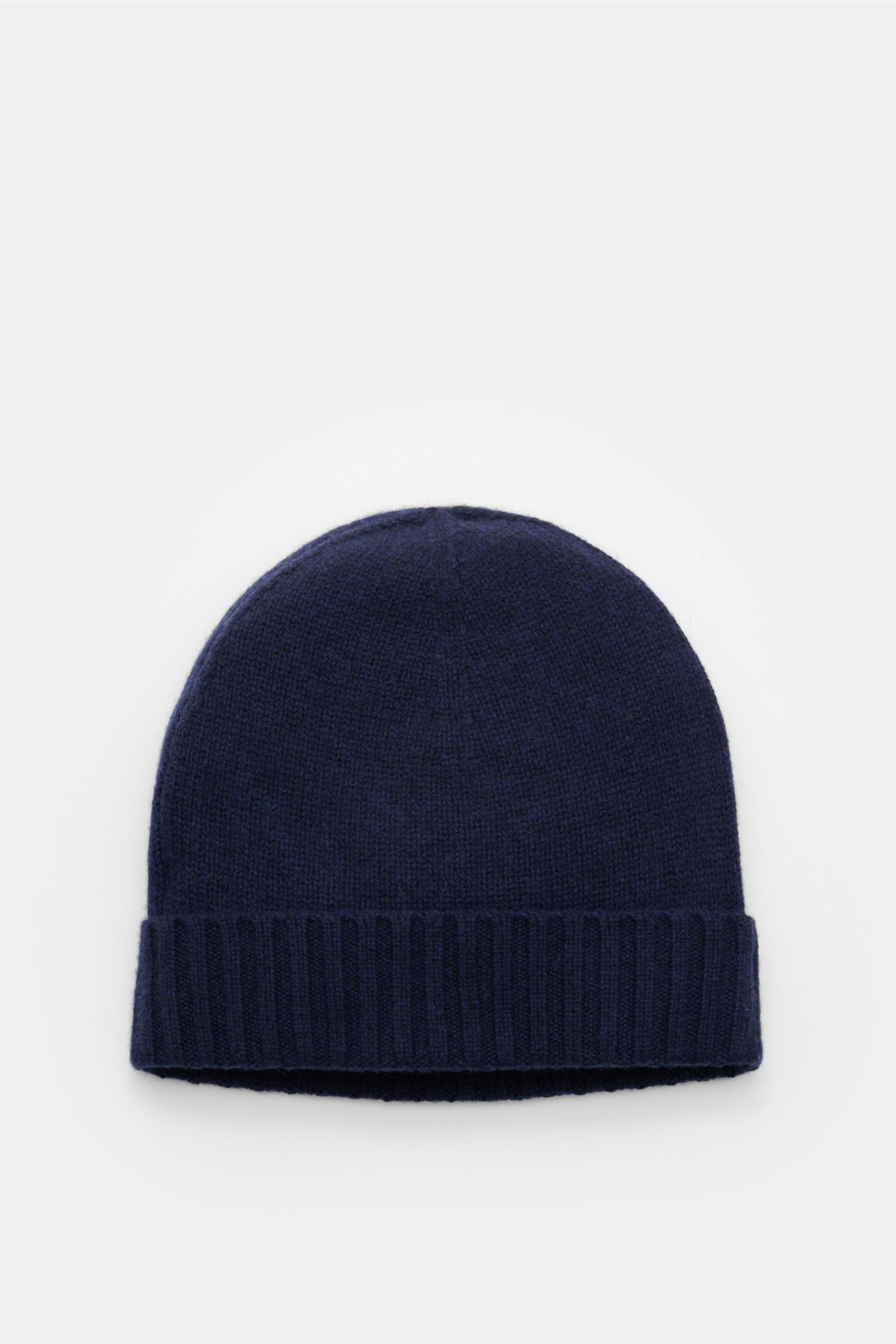 von Braun Cashmere Mütze navy, von oben fotografiert, feines Strickbild, schmaler Umschlag, reiner Cashmere, sehr weicher Griff, soft und elegant.