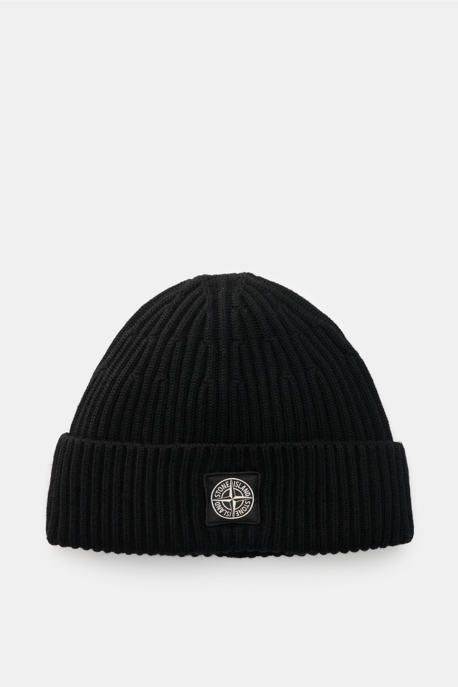 Stone Island Wool beanie black shown from a front perspective, featuring pure wool, soft feel, modern rib knit look, wide turn-up, and front with STONE ISLAND woven label.