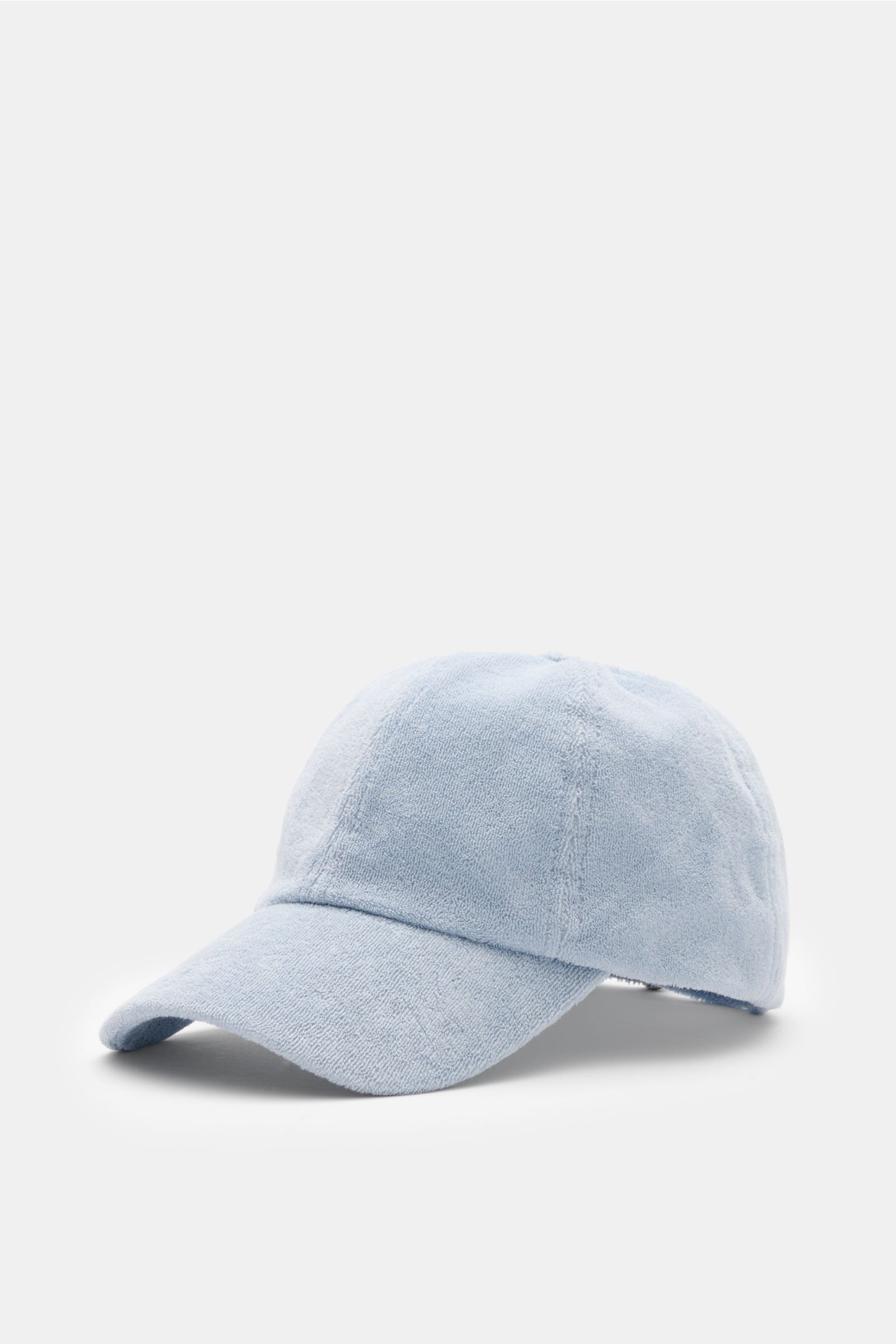 Front-side view of the 04651/ A trip in a bag Frottee-Cap 'Oyster' hellblau in soft light blue terry cotton, featuring a sporty style, adjustable closure, and subtle back label, perfect for beach or promenade.

Description: Das sportlich-stylishe Baseb