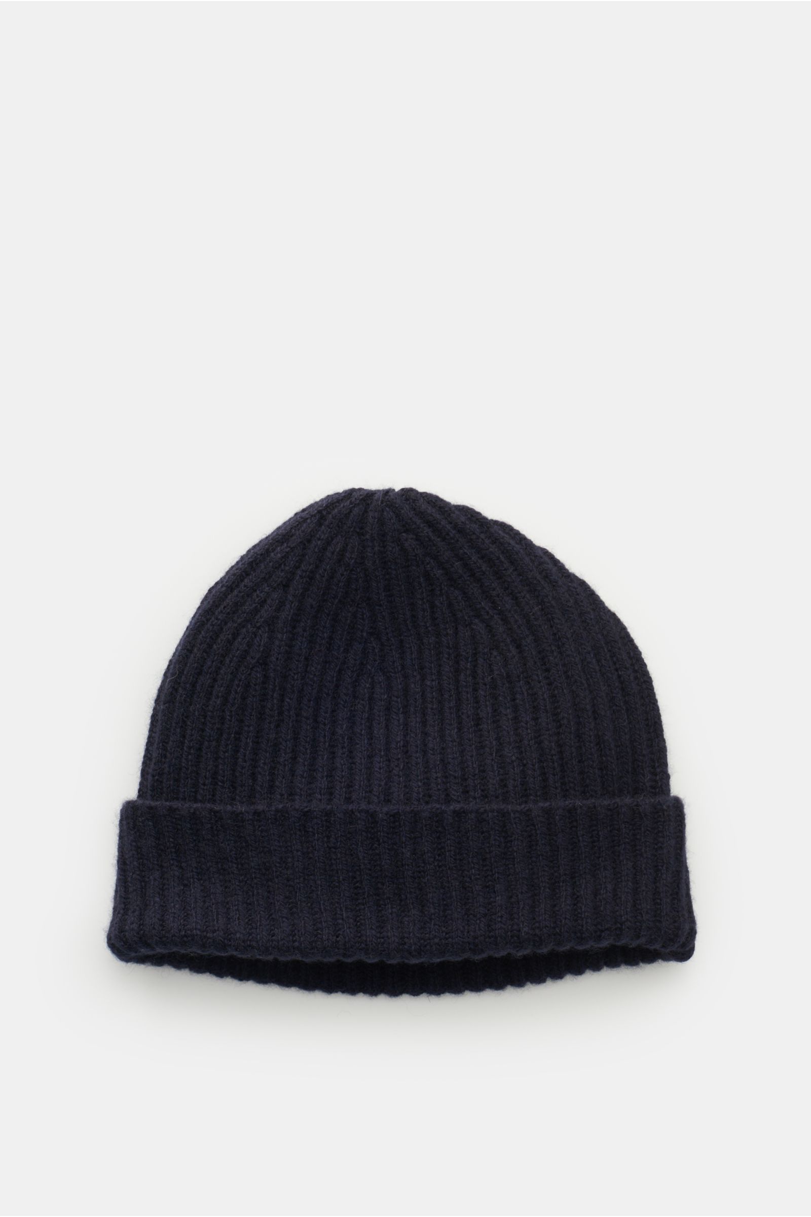 Top-down view of a navy blue Cruciani Cashmere Mütze navy with a narrow cuff, ribbed patent knit pattern, and fine knit texture made of pure cashmere.

Für warme Wintermomente mit Stil: Diese Patentstrickmütze von CRUCIANI aus reinem Cashmere mit schma