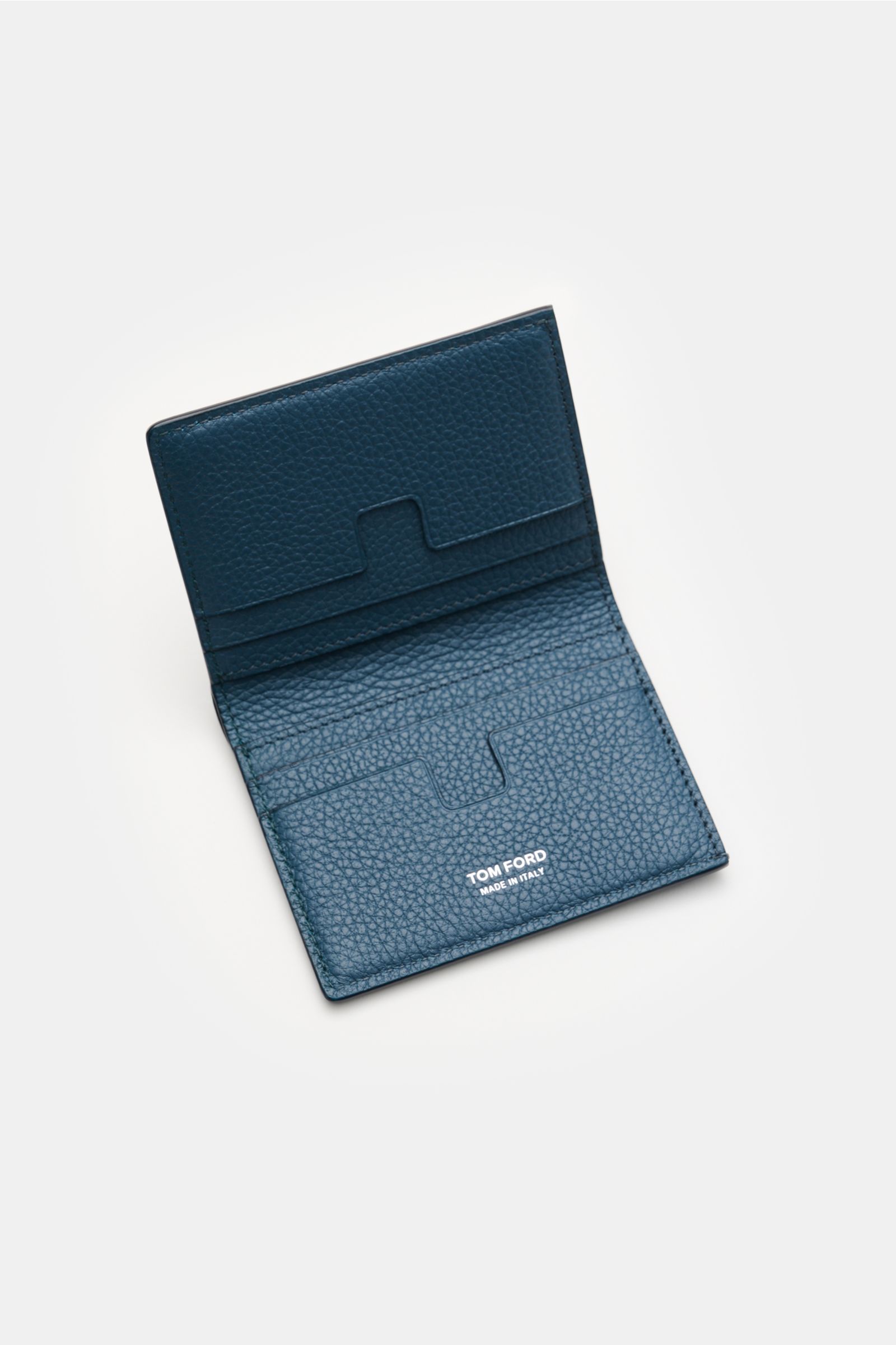Opened Tom Ford Portemonnaie navy in pebbled navy calf leather, photographed from above, showing six card slots and logo.

Description: Unverzichtbarer Alltagsbegleiter: Minimalistische Ästhetik und hochwertiges Kalbleder prägen dieses stylishe TOM FOR