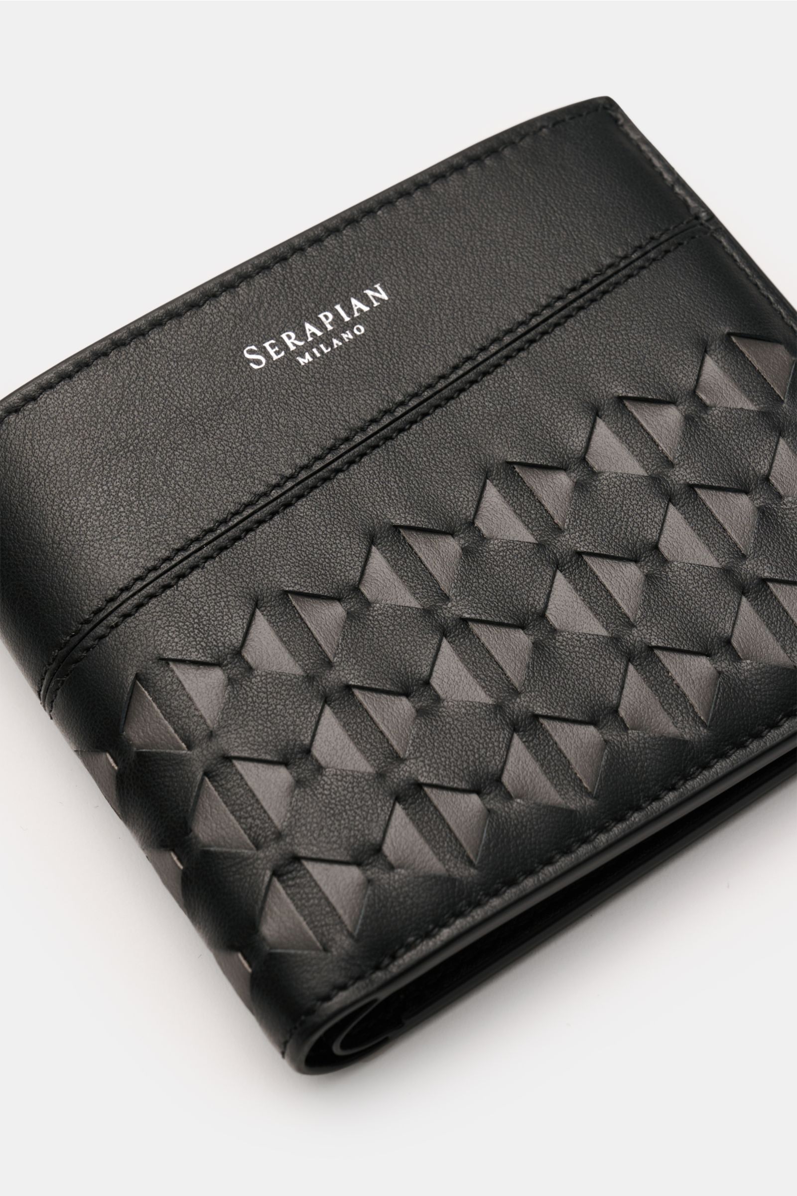 Folded Serapian Portemonnaie 'Mosaico' schwarz/dunkelgrau shown from a top angled view, featuring fine grain smooth leather and signature Mosaico pattern.

Description: Stilvoll verstaut: Das klappbare Portemonnaie von SERAPIAN aus edlem Glattleder prä