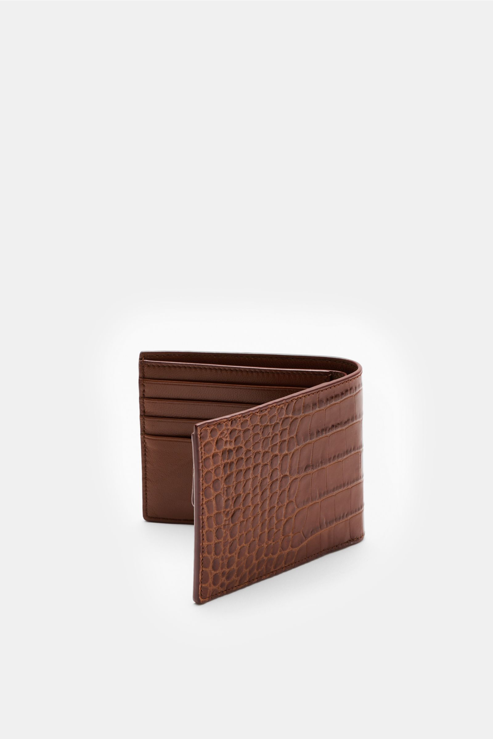 Tom Ford Portemonnaie braun aus edlem Kalbleder im Reptilien-Look, offen stehend seitlich fotografiert mit sichtbaren Kartenfächern und Logo-Prägung.