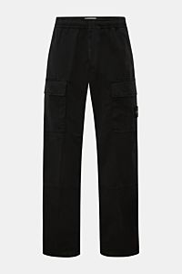 Front view of Stone Island Jogger pants black, relaxed fit with elastic waistband, patch pockets, zip fly, and signature compass badge.

These relaxed fit jogger pants made of high-quality, slightly stretchy cotton from STONE ISLAND have everything you
