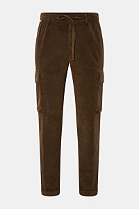 Front view of 04651/ A trip in a bag Corduroy cargo pants brown, wide wale cotton corduroy with slight stretch, soft feel, tapered fit, regular thigh width, ankle length, slightly tapered cut, zip and waist button, partially elasticated waistband with dra