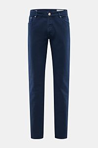 Front view of Brunello Cucinelli Jeans 'Traditional Fit' navy, relaxed tapered cotton denim with button fly, five-pocket style, logo coin pocket, and leather patch. A luxurious denim classic from BRUNELLO CUCINELLI: The versatile jeans 'Traditional Fit