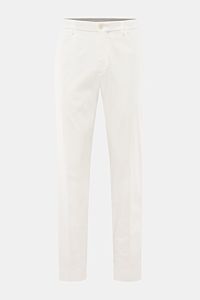 Front view of GTA Chino 'Davide' creme pants made of pure cotton twill, featuring elastic waistband, zipper, button, French pockets, slim tapered fit, and subtle logo detail.