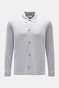 Front view of Lardini Silk knit shirt smoky blue/light grey mottled with slim fit, turn-down collar, button placket, and double-layered hems.

Effortless style: This knit shirt by LARDINI combines a fine knit in pure silk with exceptional comfort. Airy