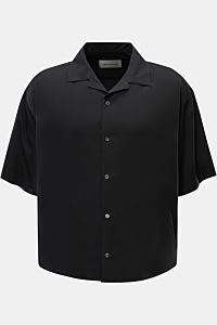 A front view of Ami Paris Short sleeve shirt 'Boxy' Cuban collar black, a modern, casual short sleeve shirt with pure viscose, soft feel, oversized fit, French button placket, logo stitching, and rounded hem. Modern and casual: With its 'Boxy' fit, this s