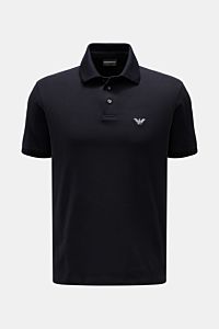 Emporio Armani Polo shirt navy shown from the front, a timeless, casual piqué jersey made of pure cotton with regular fit, classic collar, label stitching on the chest, and hem with side vents. A versatile classic for sporty looks: This polo shirt by EMPO