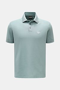 Emporio Armani Polo shirt sage shown from the front, classic casual design in piqué cotton with chest label stitching, regular fit, side vents.