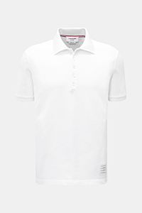 Front view of Thom Browne Polo shirt white in pure cotton with slim fit, classic collar, five-button placket, ribbed cuffs, stretchy side inserts, and signature striped logo, a modern essential sporty elegant classic.