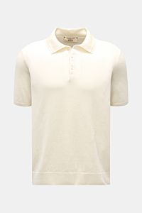 Front view of Fioroni Short sleeve knit polo cream in a lightweight linen and cotton blend, featuring a dress-shirt collar and three-button placket.  

Description: Summery luxury: This short-sleeved knit polo by FIORONI embodies the finest Italian kni