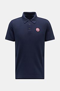 Front view of the Canada Goose Poloshirt 'Beckley' navy, made from pure cotton piqué with a regular fit, garment dyed finish, and CANADA GOOSE patch on the chest. 

Das klassische Poloshirt 'Beckley' ist ein Must-have in 