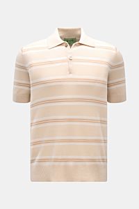 Front view of FTC FTC short sleeve knit polo beige/cream/light brown striped with a two-button placket and ribbed bands.

FTC presents this short sleeve knit polo in a fine blend of cotton, SeaCell and cashmere with an all-over striped pattern – perfec