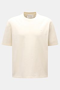 Ami Paris Rundhals-T-Shirt creme, Frontansicht, Oversized Fit, Jersey aus Baumwolle, abgesteppte Herz-Logo, weicher Griff, Rundhalsausschnitt.