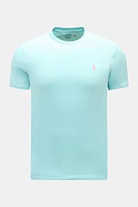 Front view of a Polo Ralph Lauren Crew neck T-shirt light blue, featuring a slim silhouette, soft pure cotton jersey, crew neck, and signature pink logo stitching on the chest.

A sporty classic: This soft T-shirt in pure cotton by POLO RALPH LAUREN co