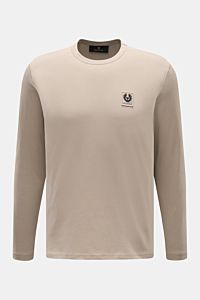 Front view of Belstaff Crew neck long sleeve beige top in lightweight cotton jersey with slim fit and chest logo patch.

Description: Lightweight cotton jersey as a starting point for everyday comfort: This classic crew neck long sleeve top from British l