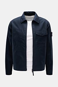 Front view of Stone Island Overshirt 'Ghost Piece' navy in dense woven pure cotton canvas, slim fit, with wind- and water-repellent fabric, robust two-way zipper, turn-down collar, buttoned chest flap pocket, tonal badge on upper arm, and buttoned sleeve 