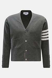 Front view of Thom Browne Cashmere Cardigan dunkelgrau meliert in dark gray melange, featuring pure cashmere, soft touch, fine knit, regular fit, button placket, patch pockets, wide rib cuffs, and buttoned side slits.